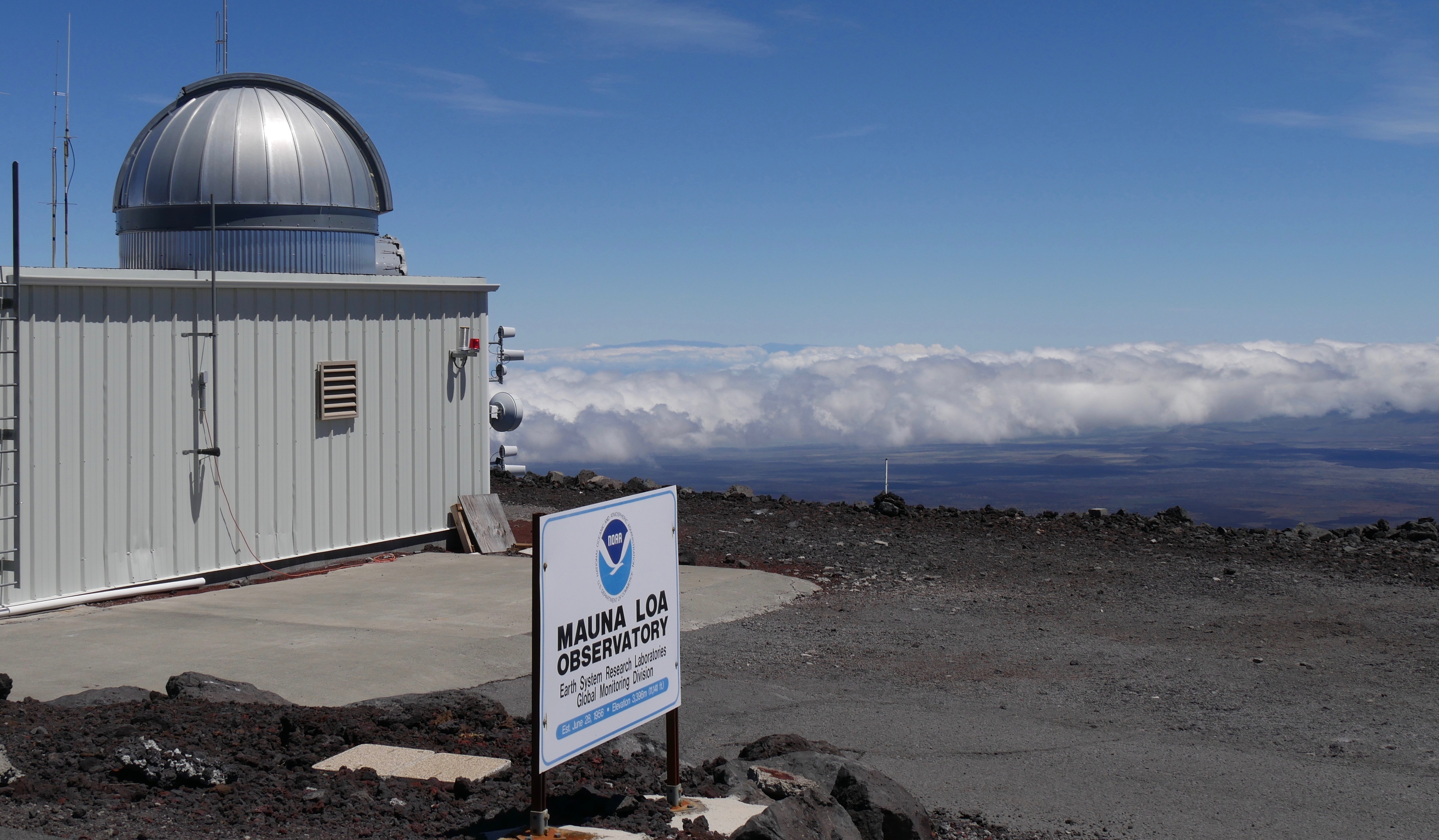 This 2019 photo provided by NOAA shows the Mauna Loa atmospheric baseline observatory, high atop Hawaii’s largest mountain, which samples well-mixed background air free of local pollution