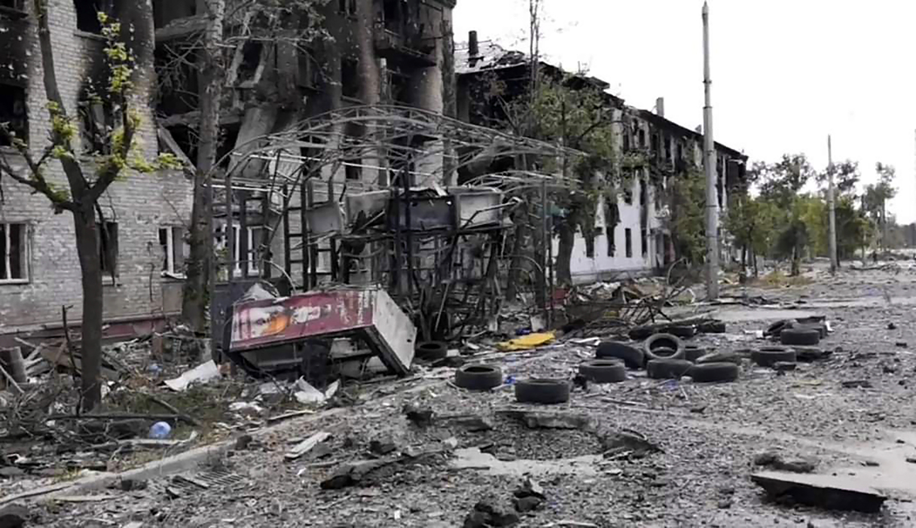 A photo provided by the Luhansk region military administration shows damaged residential buildings in Lysychansk