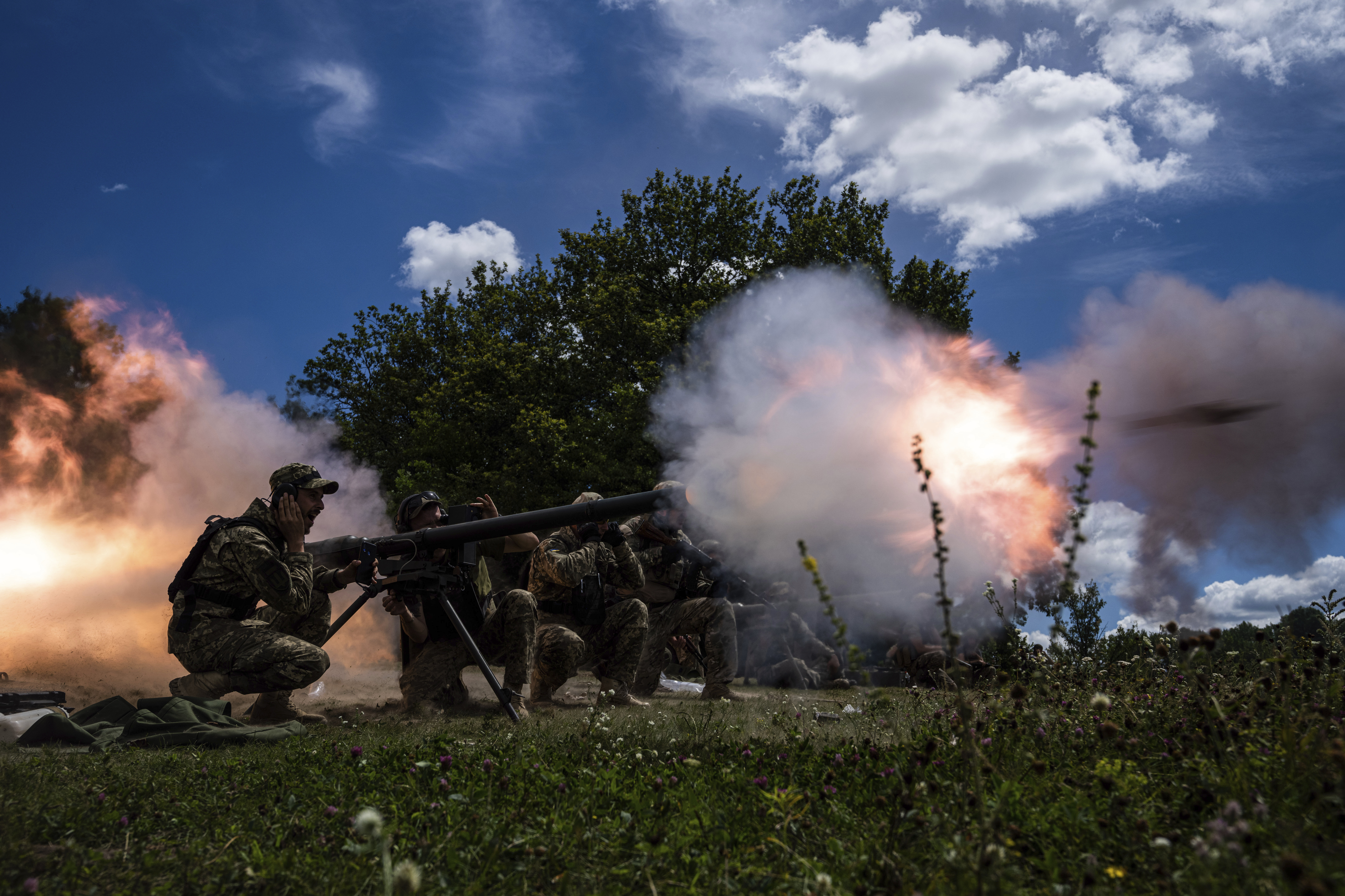 Ukrainian servicemen shoot with SPG-9 recoilless gun during training in the Kharkiv region