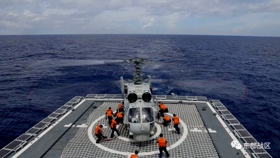 A Navy Force helicopter under the Eastern Theatre Command of China's People's Liberation Army (PLA) takes part in military exercises in the waters around Taiwan, at an undisclosed location on August 8, 2022