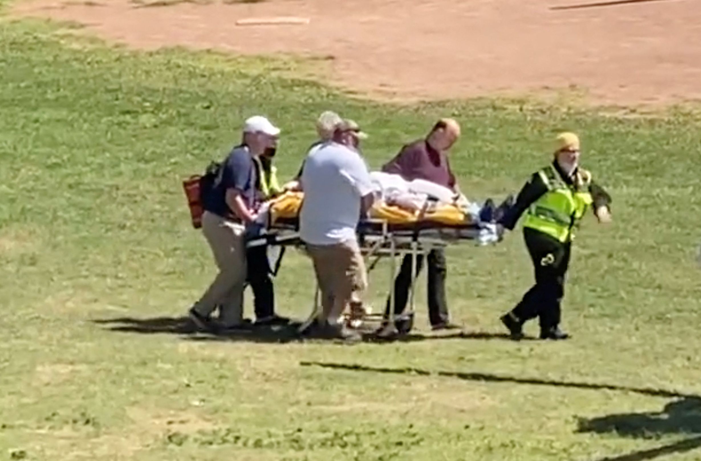 Author Salman Rushdie is transported to a helicopter after he was stabbed 