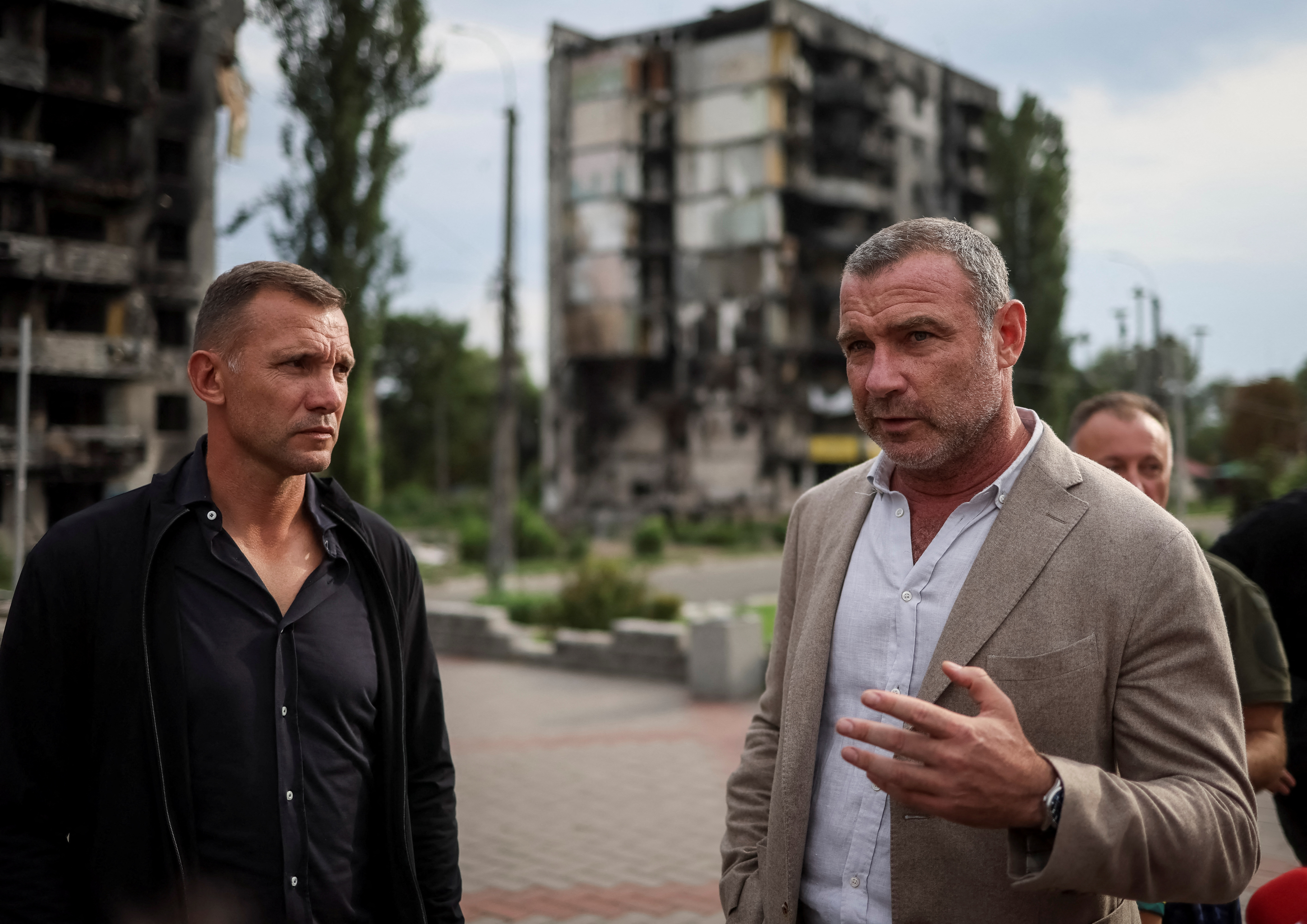 Former striker and coach of the Ukraine national football team Andriy Shevchenko and actor Liev Schreiber visit the town of Borodianka, which was heavily damaged during Russia's invasion of Ukraine, in Kyiv region