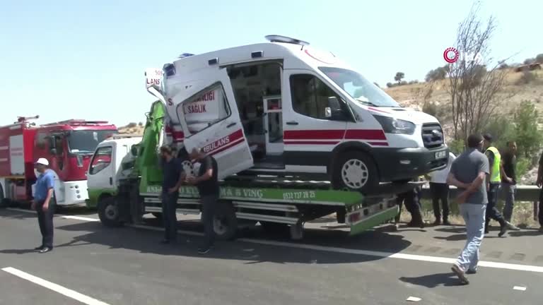 smashed car and ambulance