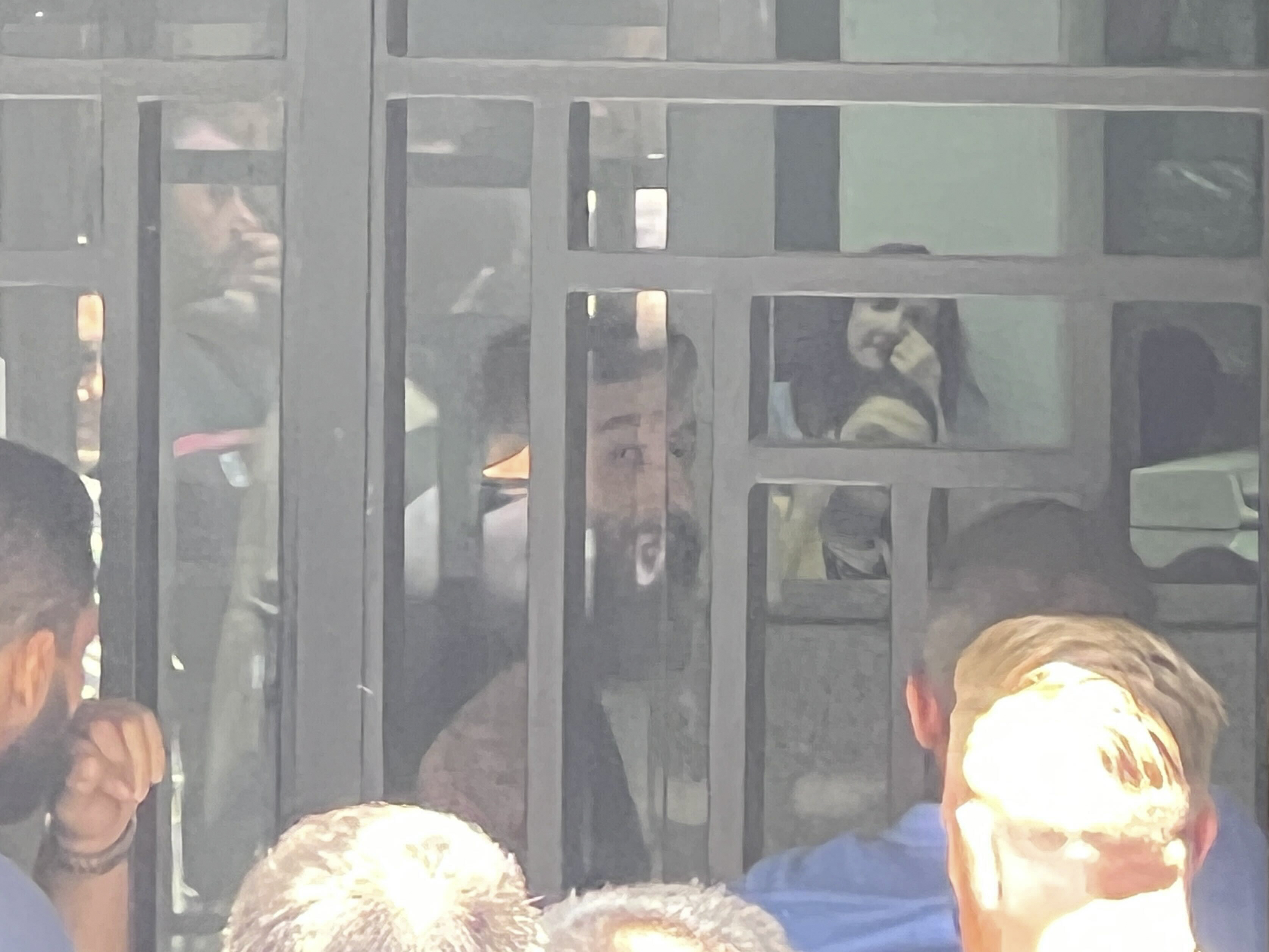 A man shouts inside the bank as he holds hostages at gunpoint in Beirut, Lebanon