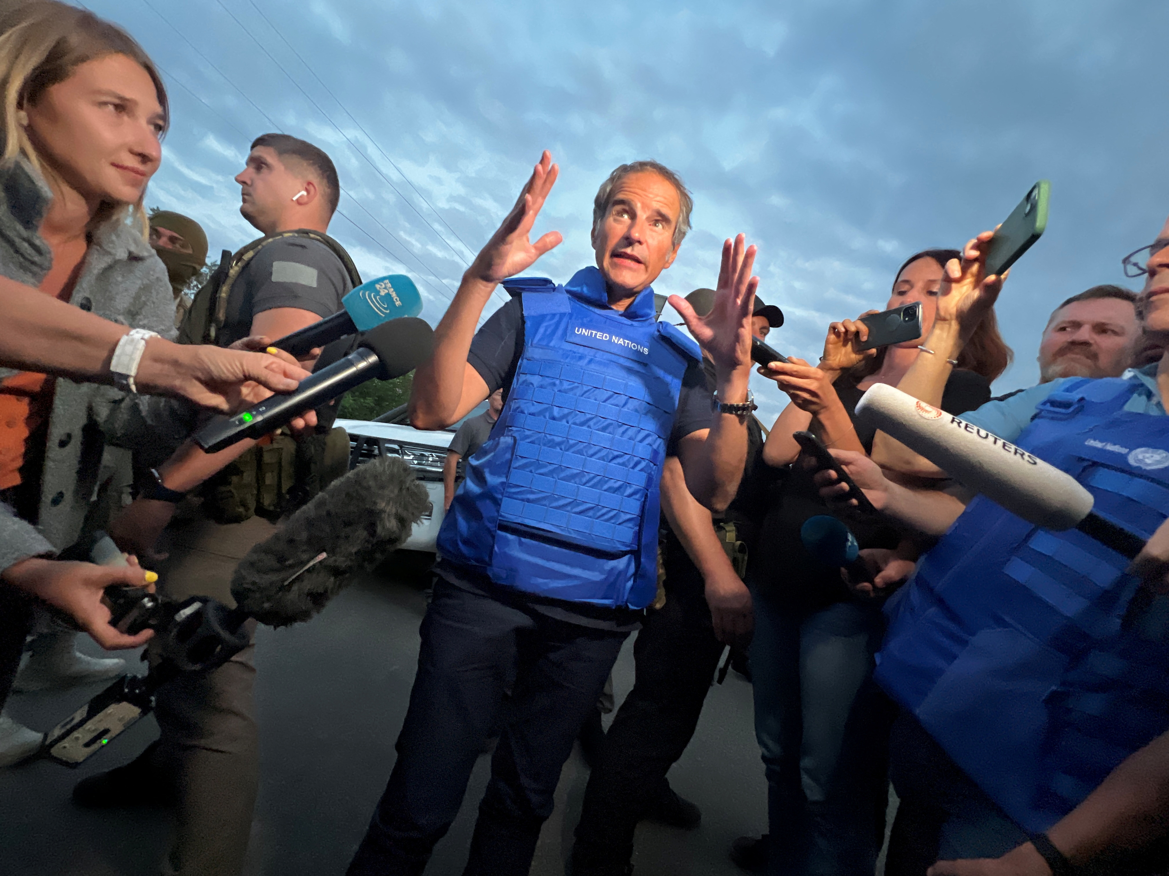 IAEA Director General Rafael Mariano Grossi speaks with journalists after he and a part of the International Atomic Energy Agency (IAEA) mission came back from a Zaporizhzhia nuclear power plant, amid Russia's invasion of Ukraine, at a Ukrainian checkpoint in Zaporizhzhia region, Ukraine