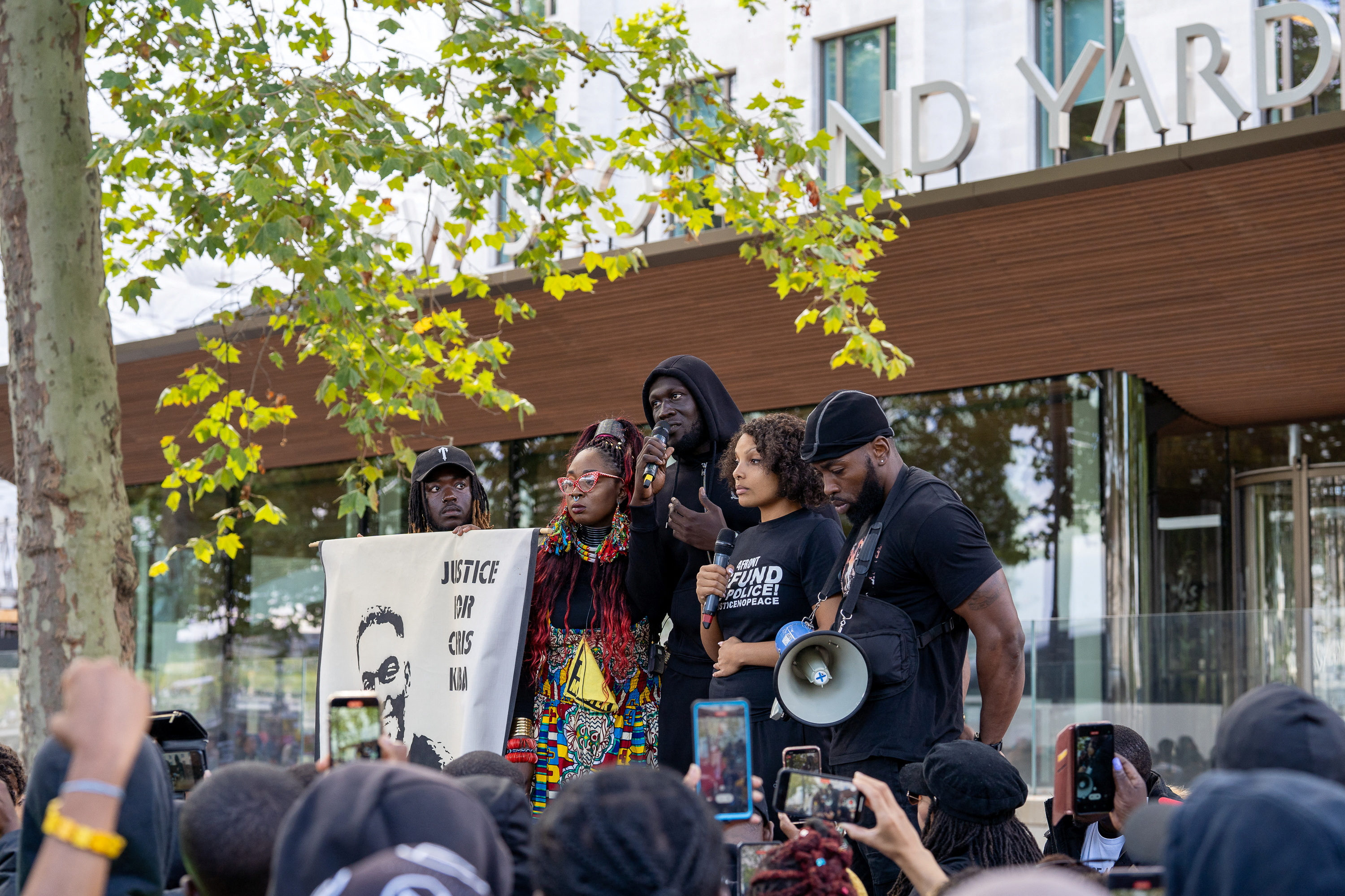 Stormzy speaks during a protest demanding justice for 24-year-old Chris Kaba