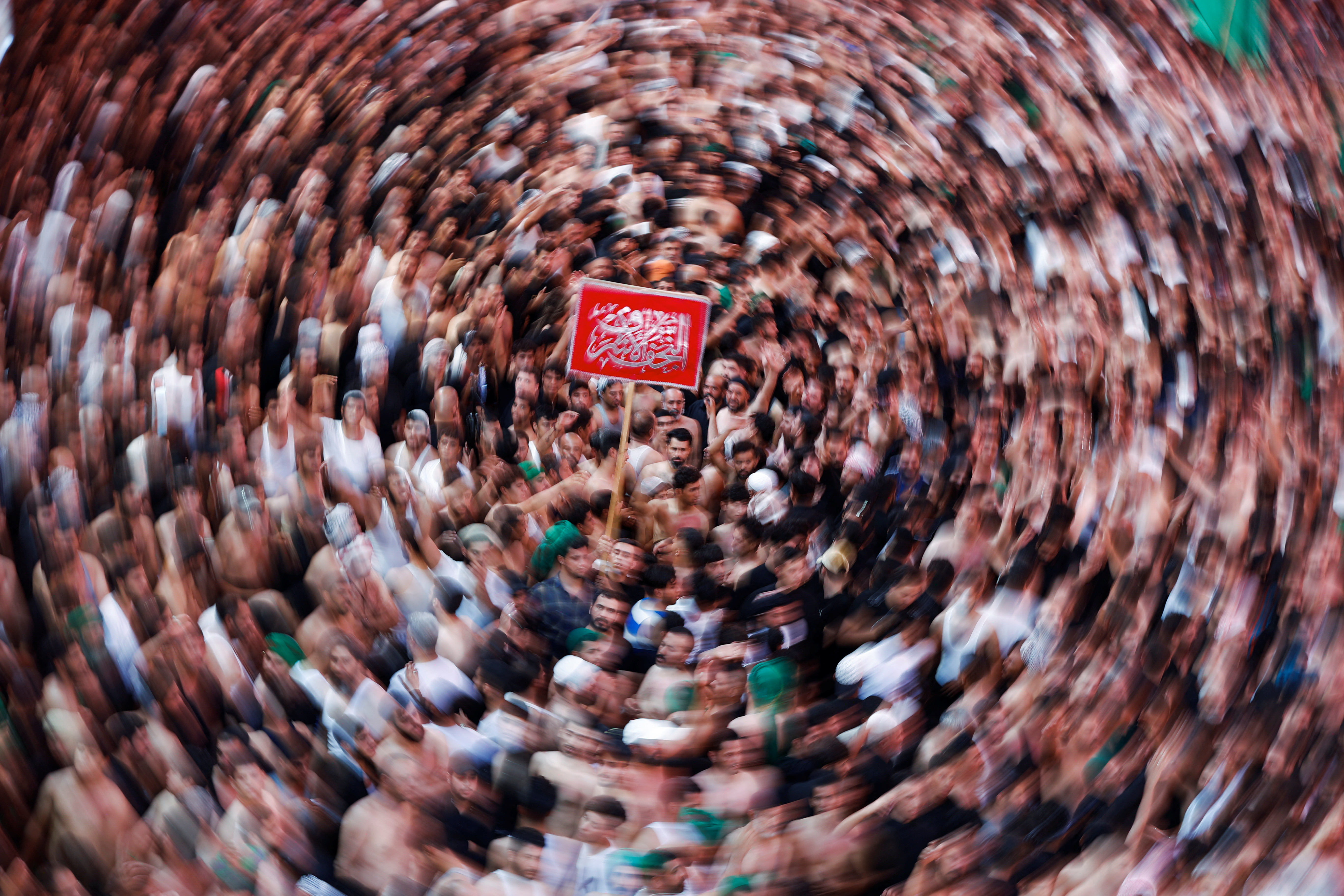 Shia Muslim pilgrims take part in Arbaeen in the holy city of Karbala, Iraq
