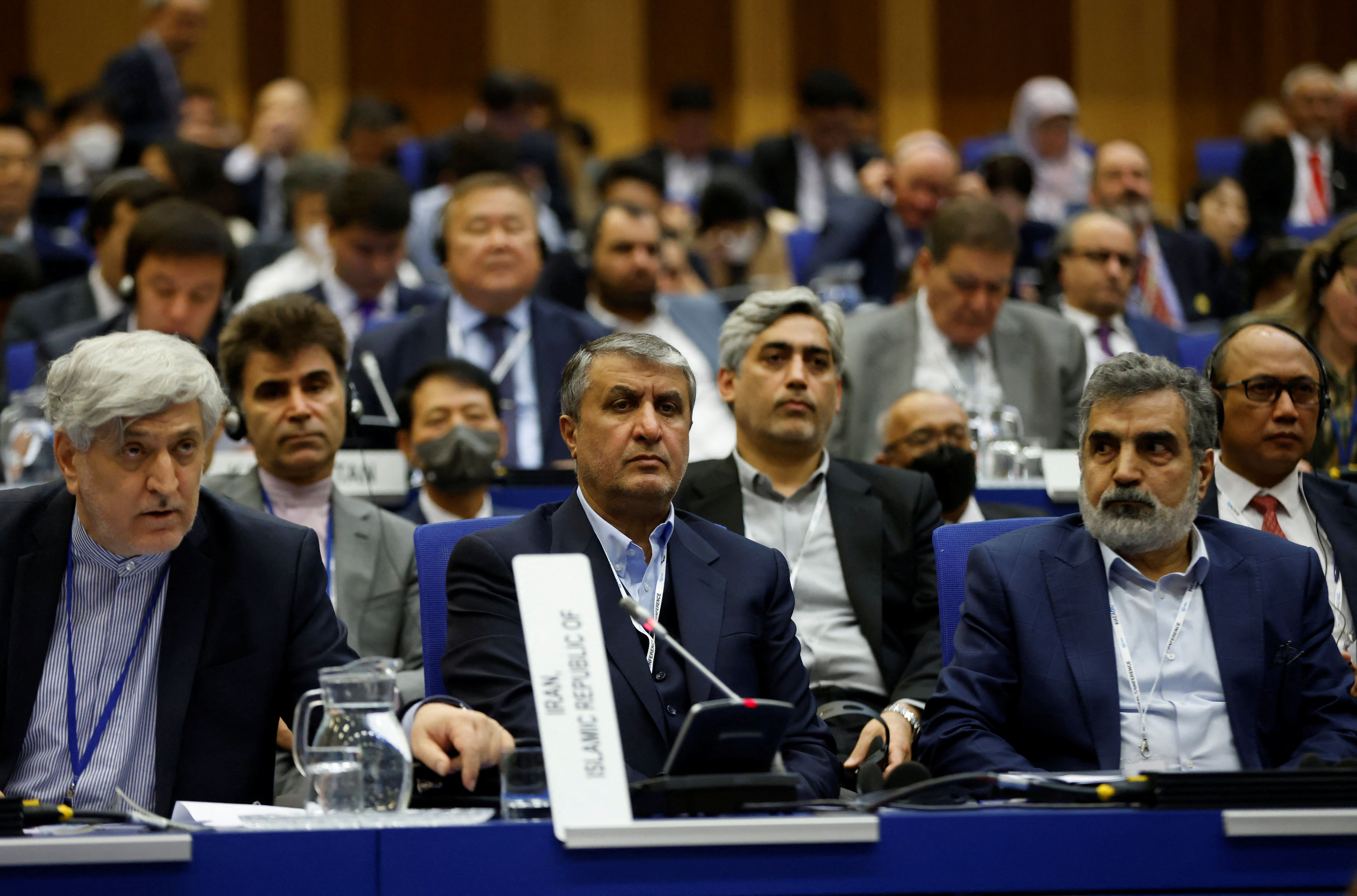 Iranian officials listening at the IAEA conference