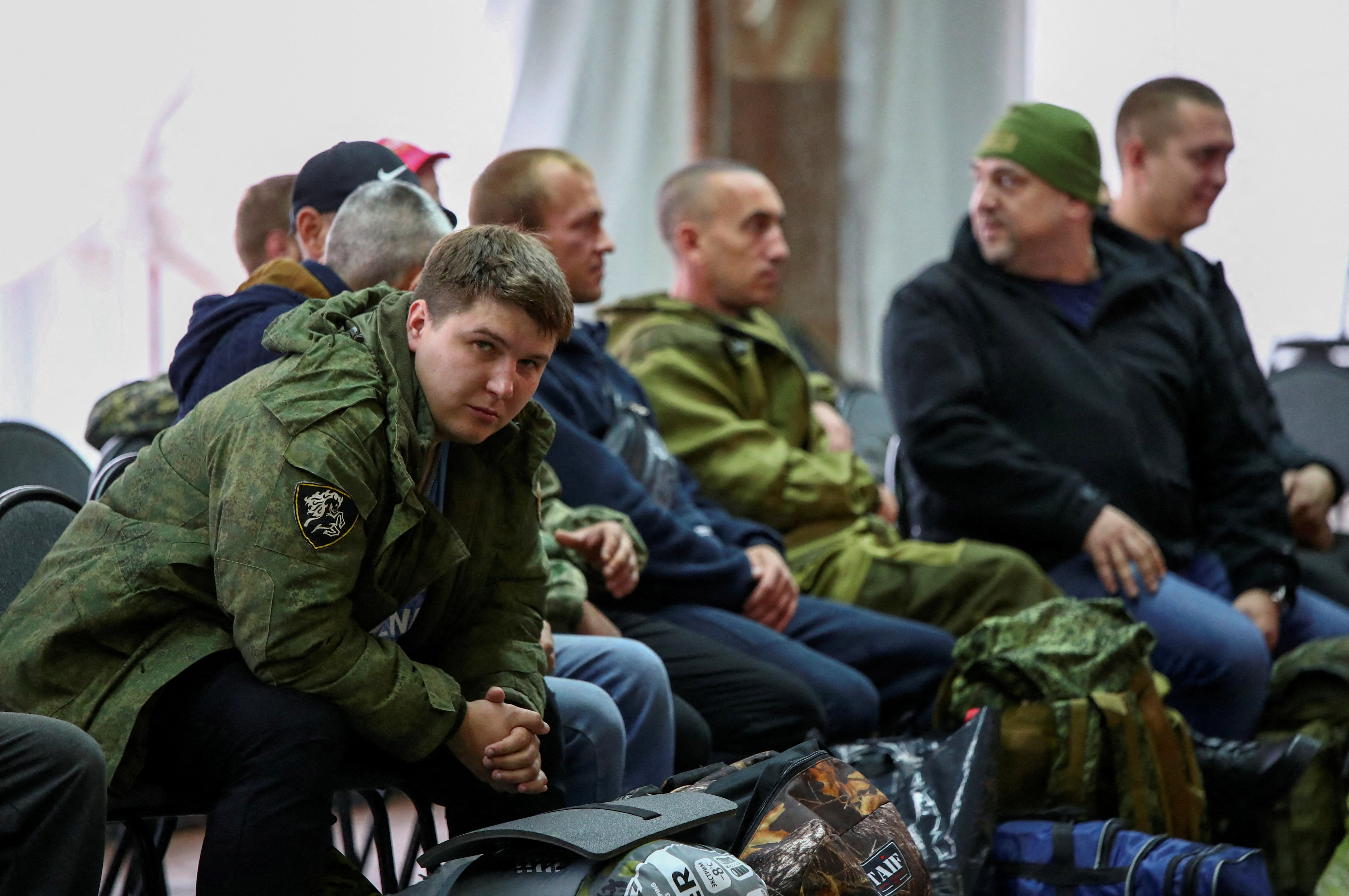 Russian reservists meet at a gathering point in the course of partial mobilization of troops, aimed to support the country's military campaign in Ukraine, in the town of Volzhsky in the Volgograd region, Russia September 28, 2022