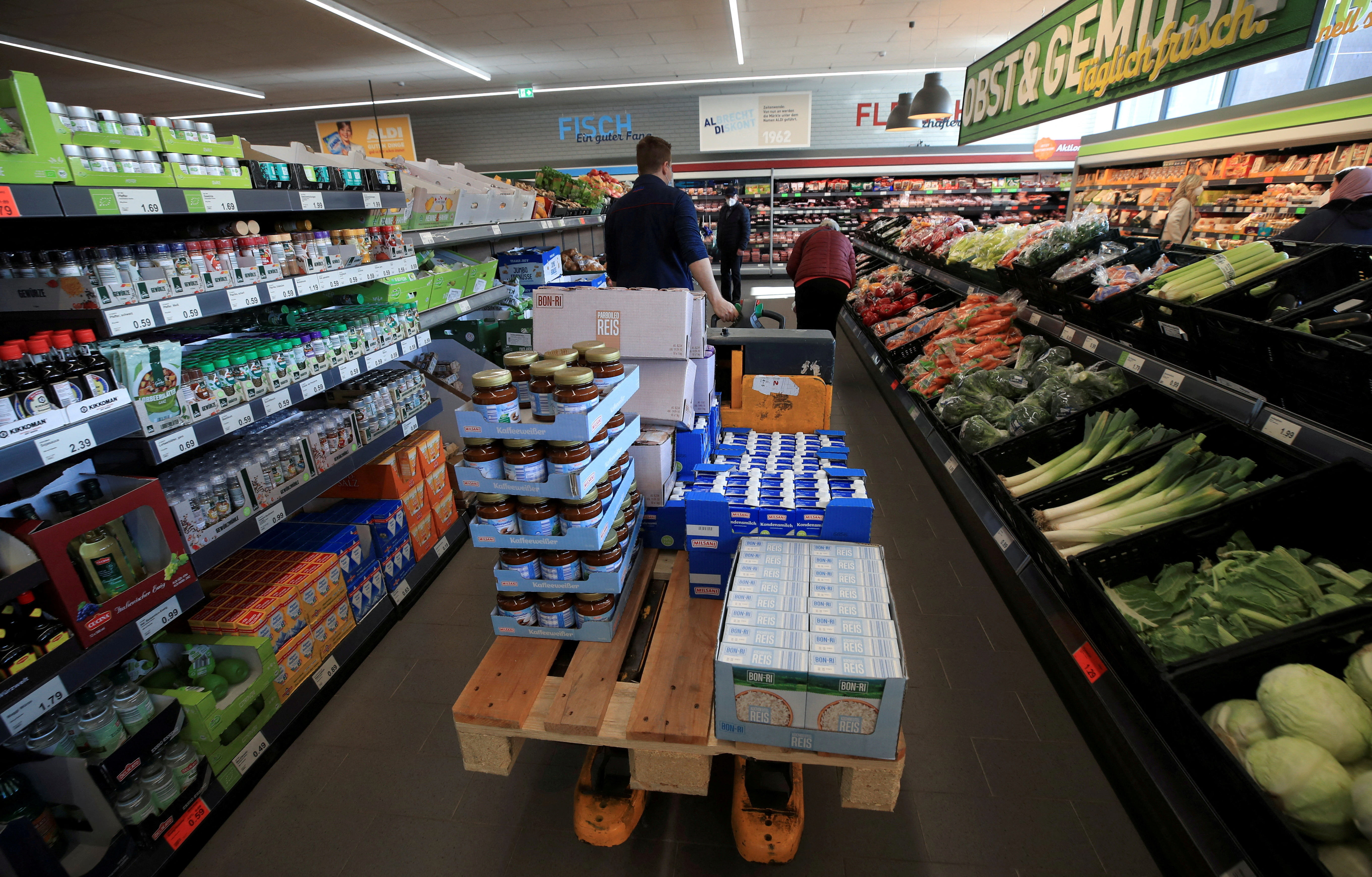An employee of German food discounter ALDI Nord in Essen Germany
