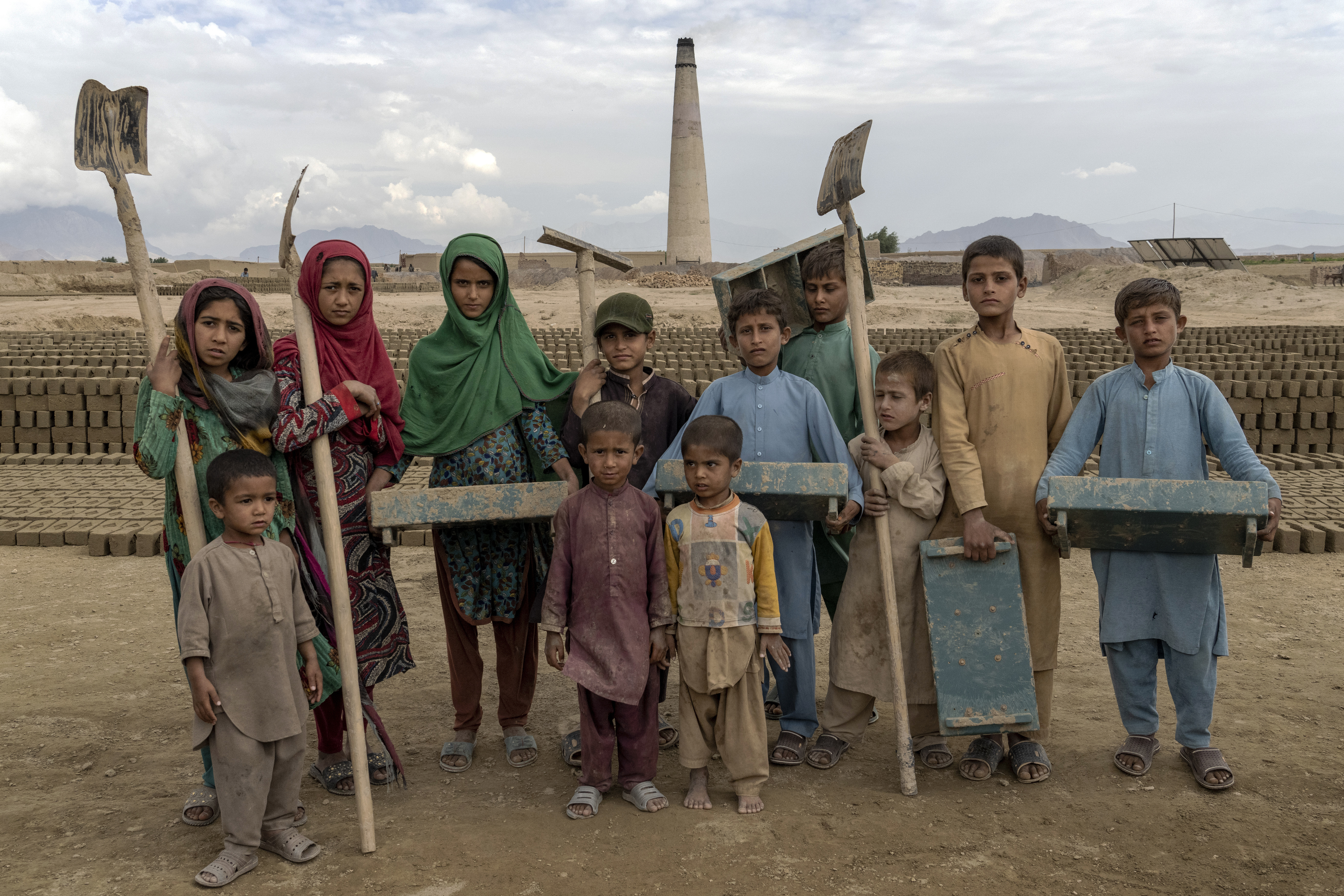 Afghan children who work at a brick factory on the outskirts of Kabul