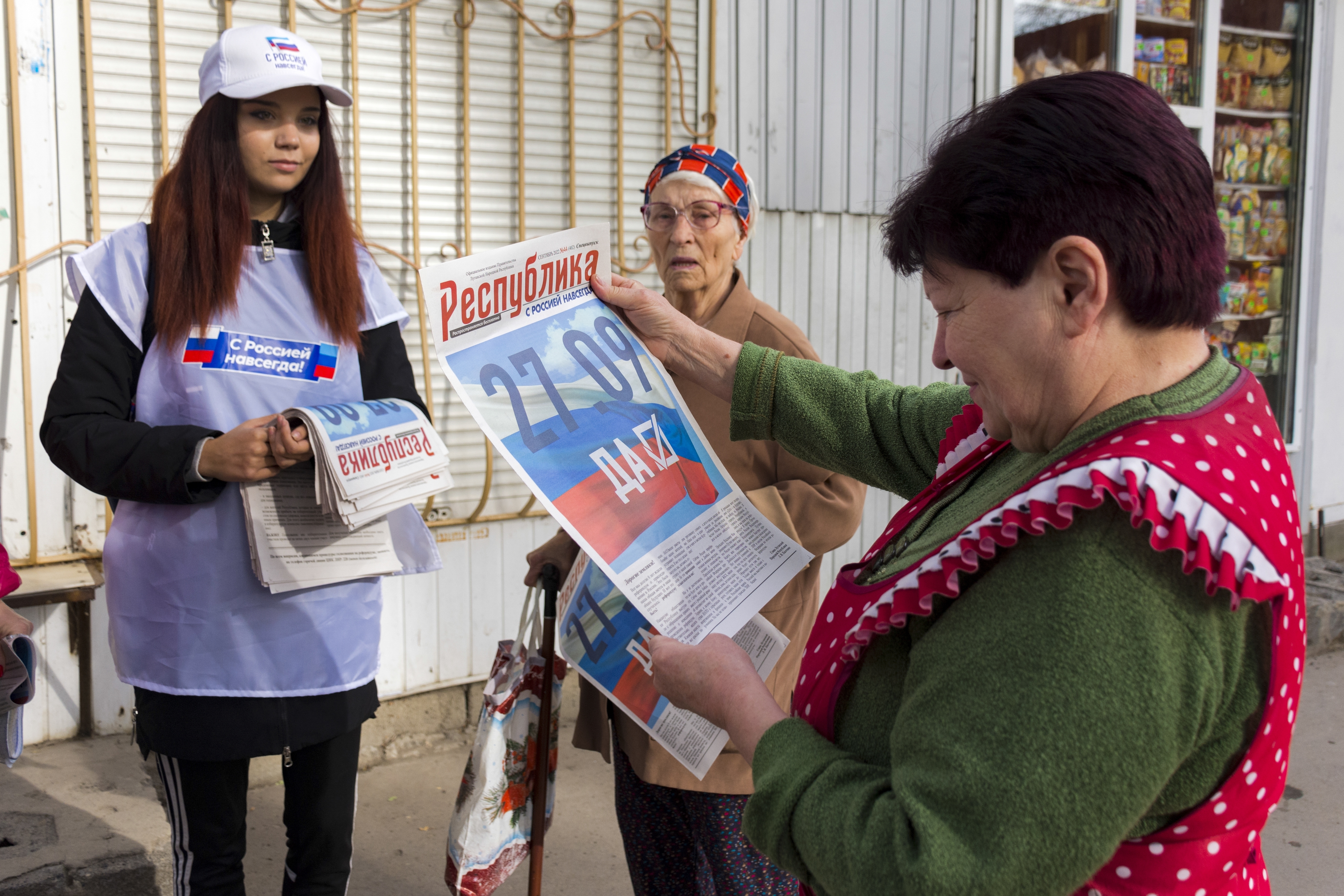 The self-styled Luhansk People’s Republic, which is backed by Russia, is one of four Russian-occupied areas of Ukraine that are due to hold referendums on becoming part of Russia. The paper, being distributed for free, reads in Russian ‘27.09 Yes’ [AP Photo]