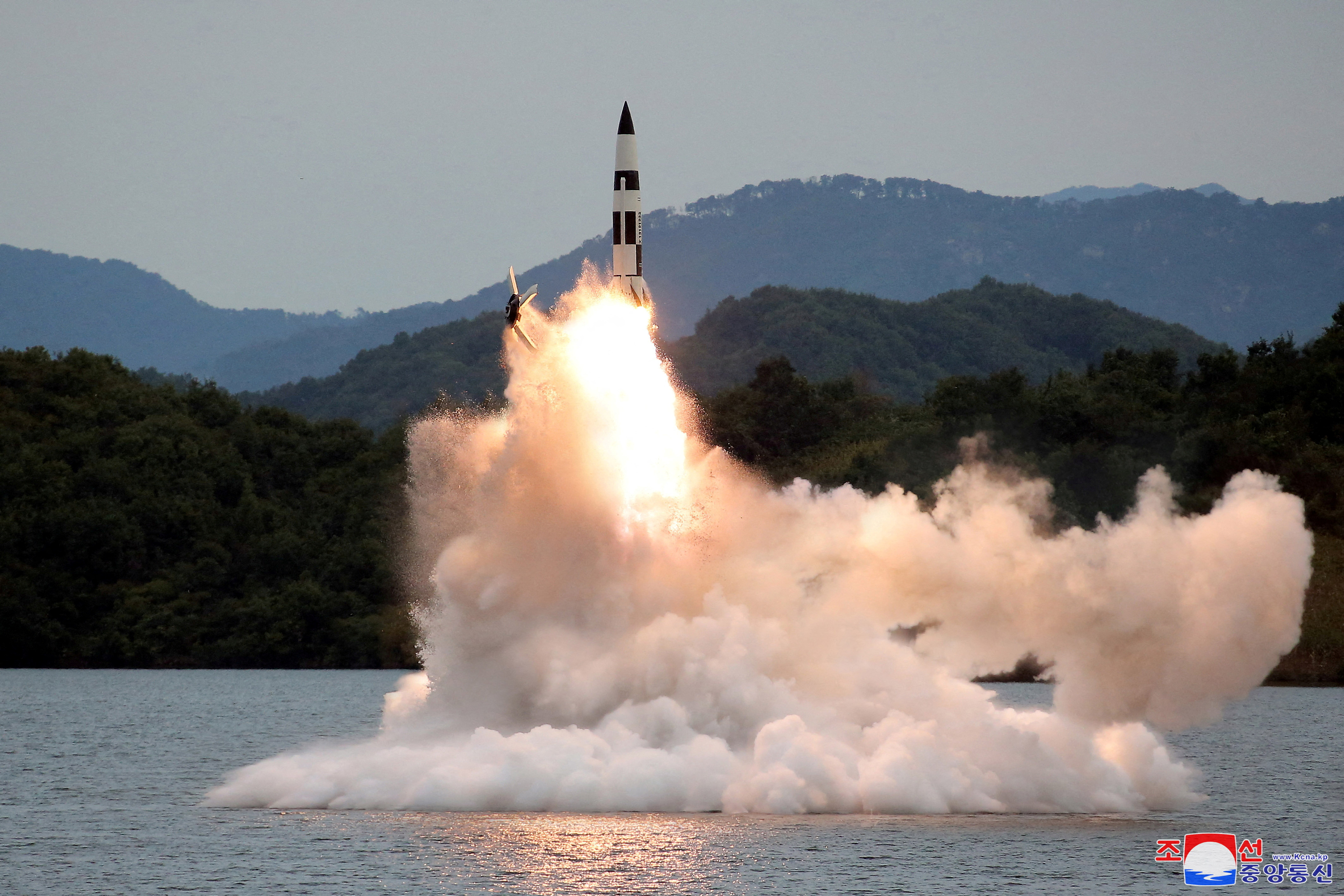 KCNA images showed a number of different types of missiles were launched from land and water [KCNA via Reuters]