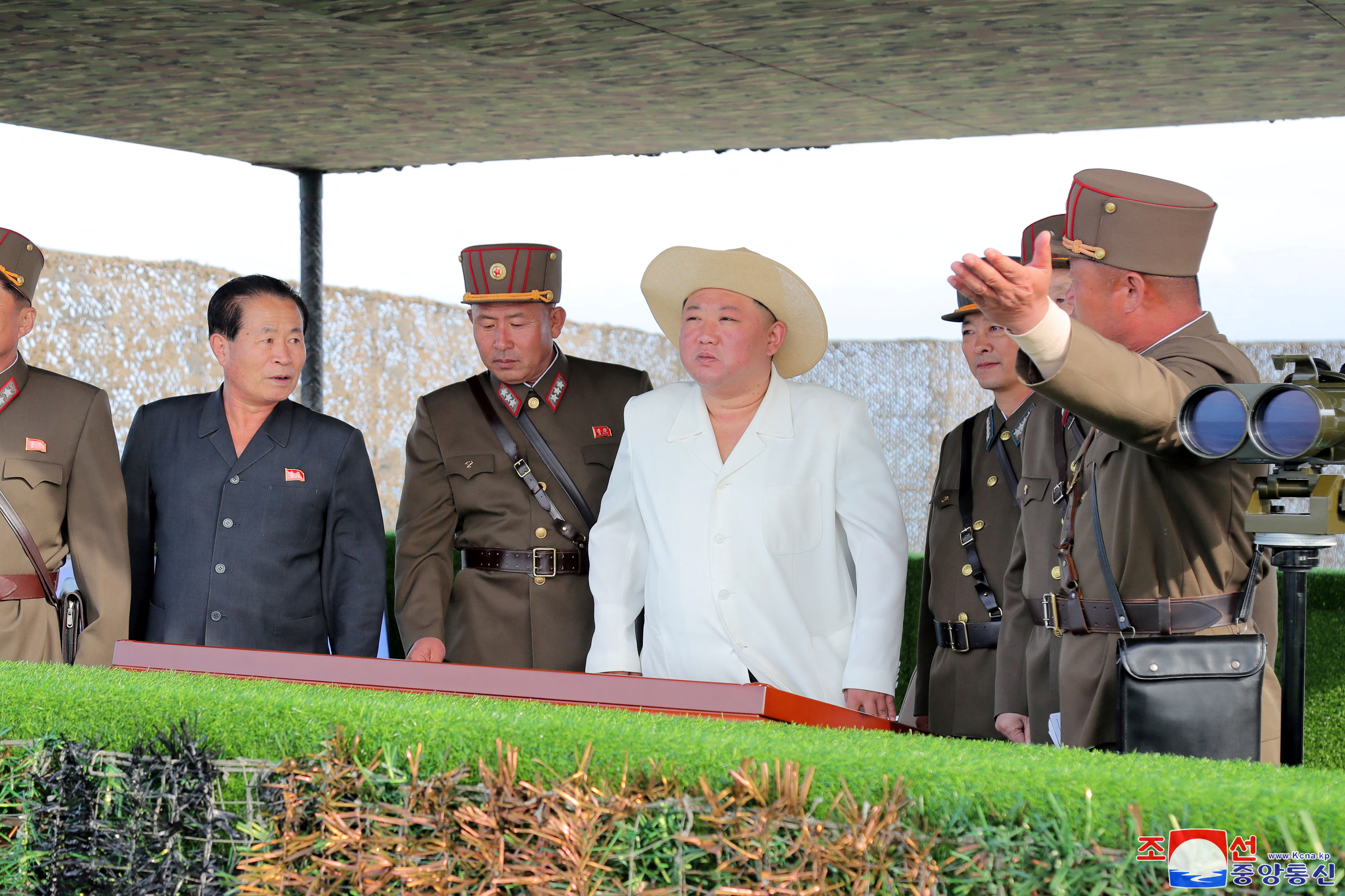 North Korean leader Kim Jong Un was shown watching missile launches at a number of locations [KCNA via Reuters]