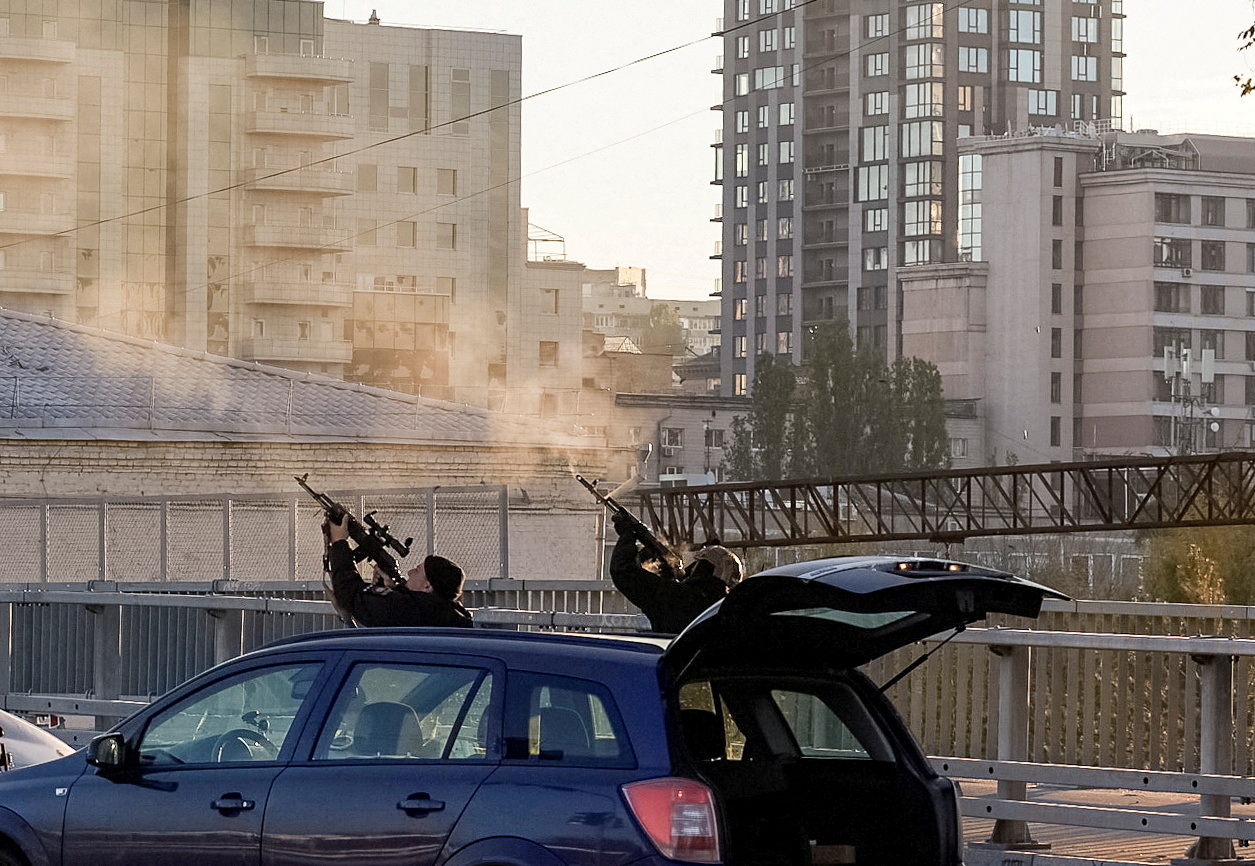 Two police officers shoot at drone targeting Kyiv.