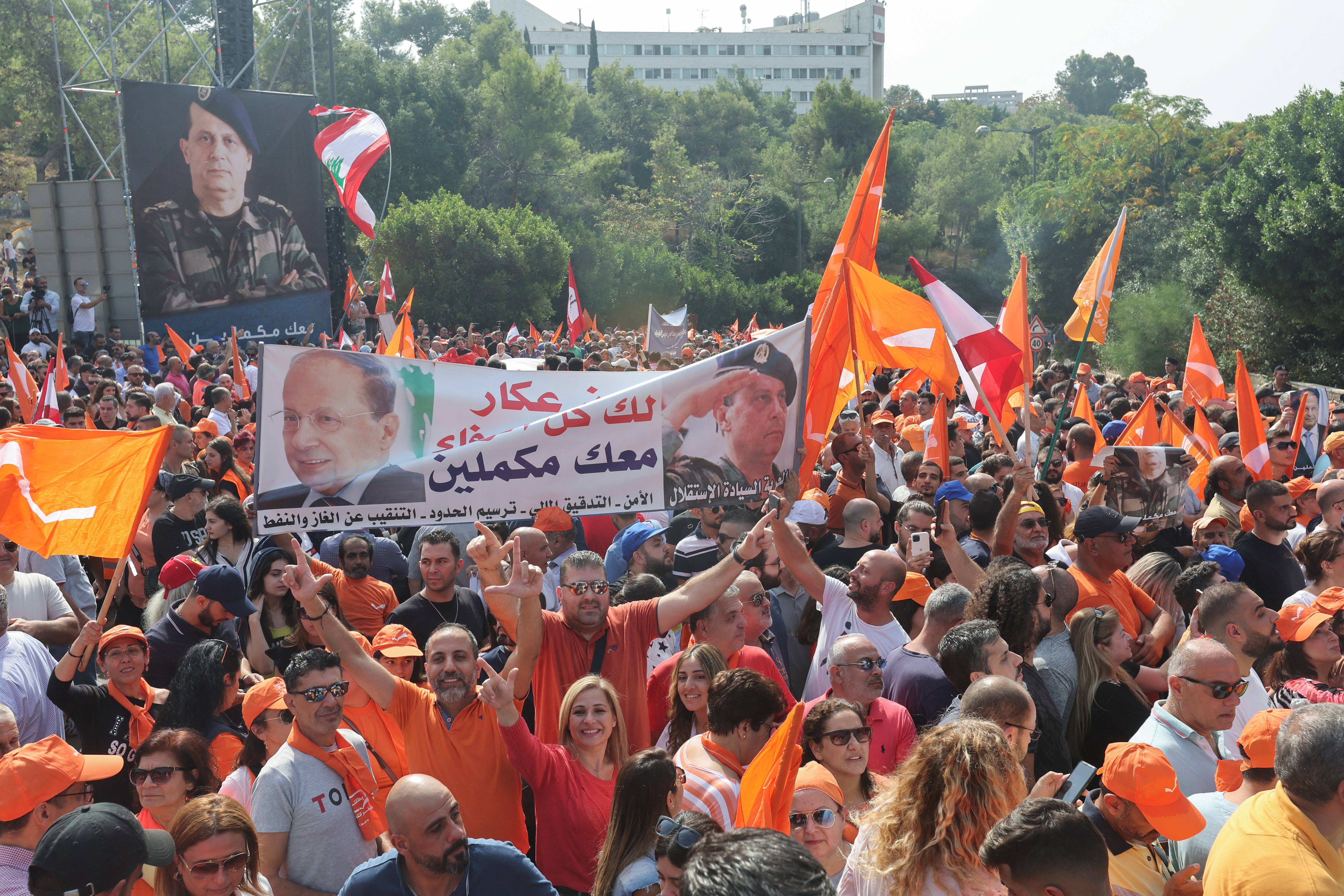 Supporters of outgoing Lebanese President Michel Aoun gather to say farewell to him near presidential palace in Baabda, Lebanon 