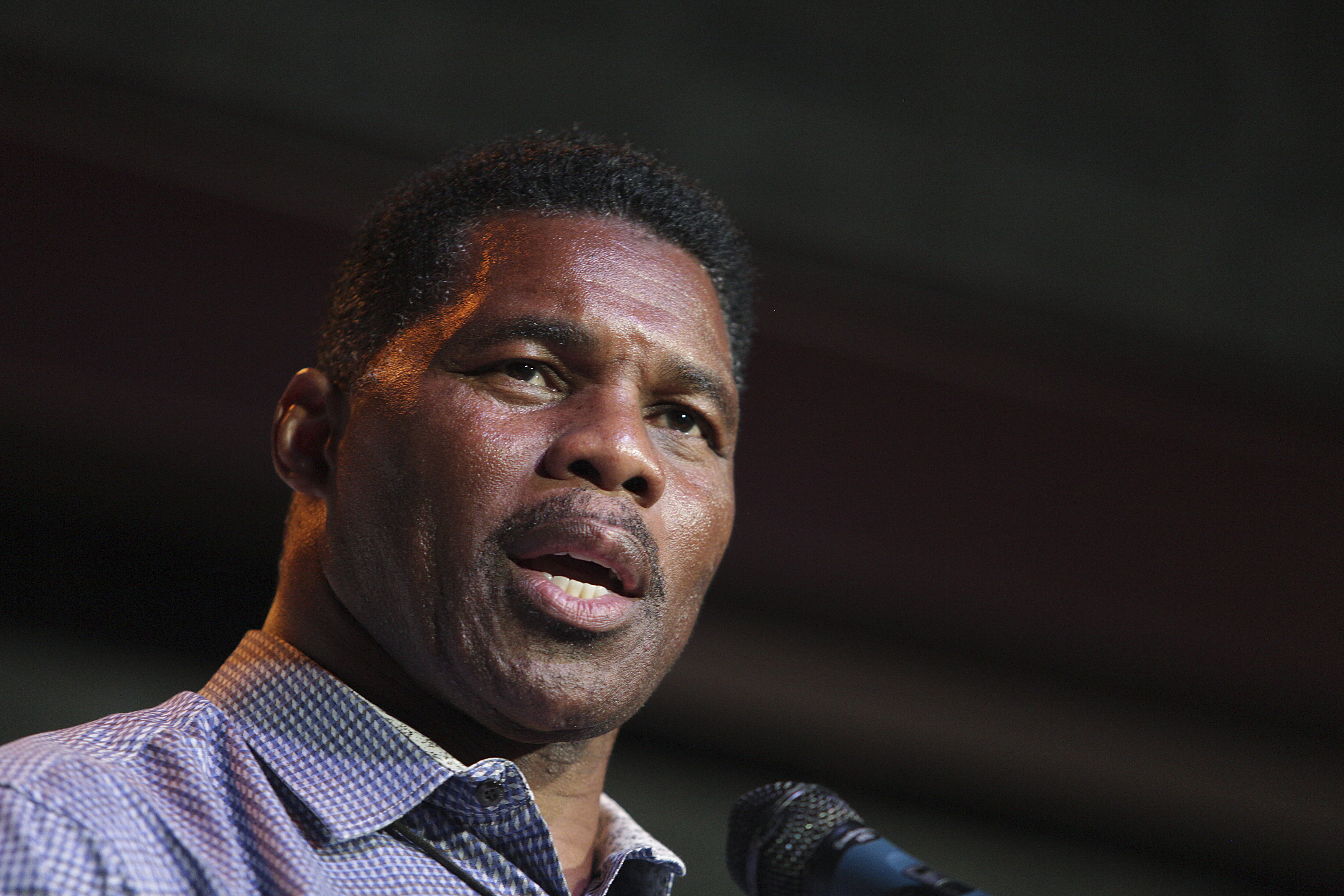 Herschel Walker, a Republican candidate for the US Senate for Georgia, speaking at a primary watch party in Athens, Georgia