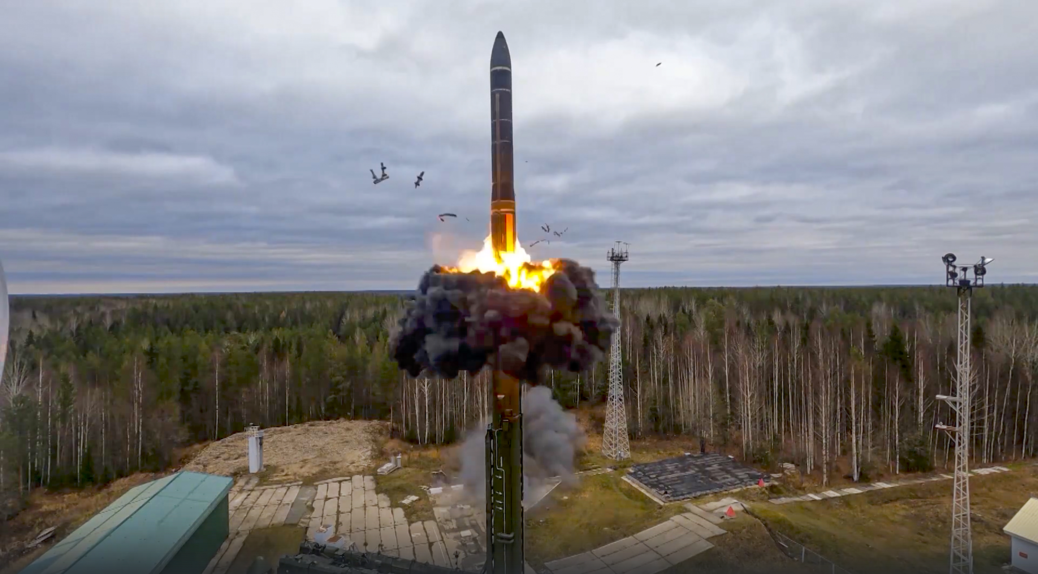 In this handout photo taken from video released by Russian Defense Ministry Press Service on Wednesday, Oct. 26, 2022, a Yars intercontinental ballistic missile is test-fired as part of Russia's nuclear drills from a launch site in Plesetsk, northwestern Russia. Russian President Vladimir Putin has monitored drills of the country's strategic nuclear forces involving multiple practice launches of ballistic and cruise missiles. The Kremlin said in a statement that all the test-fired missiles reached their designated targets. (Russian Defense Ministry Press Service via AP)