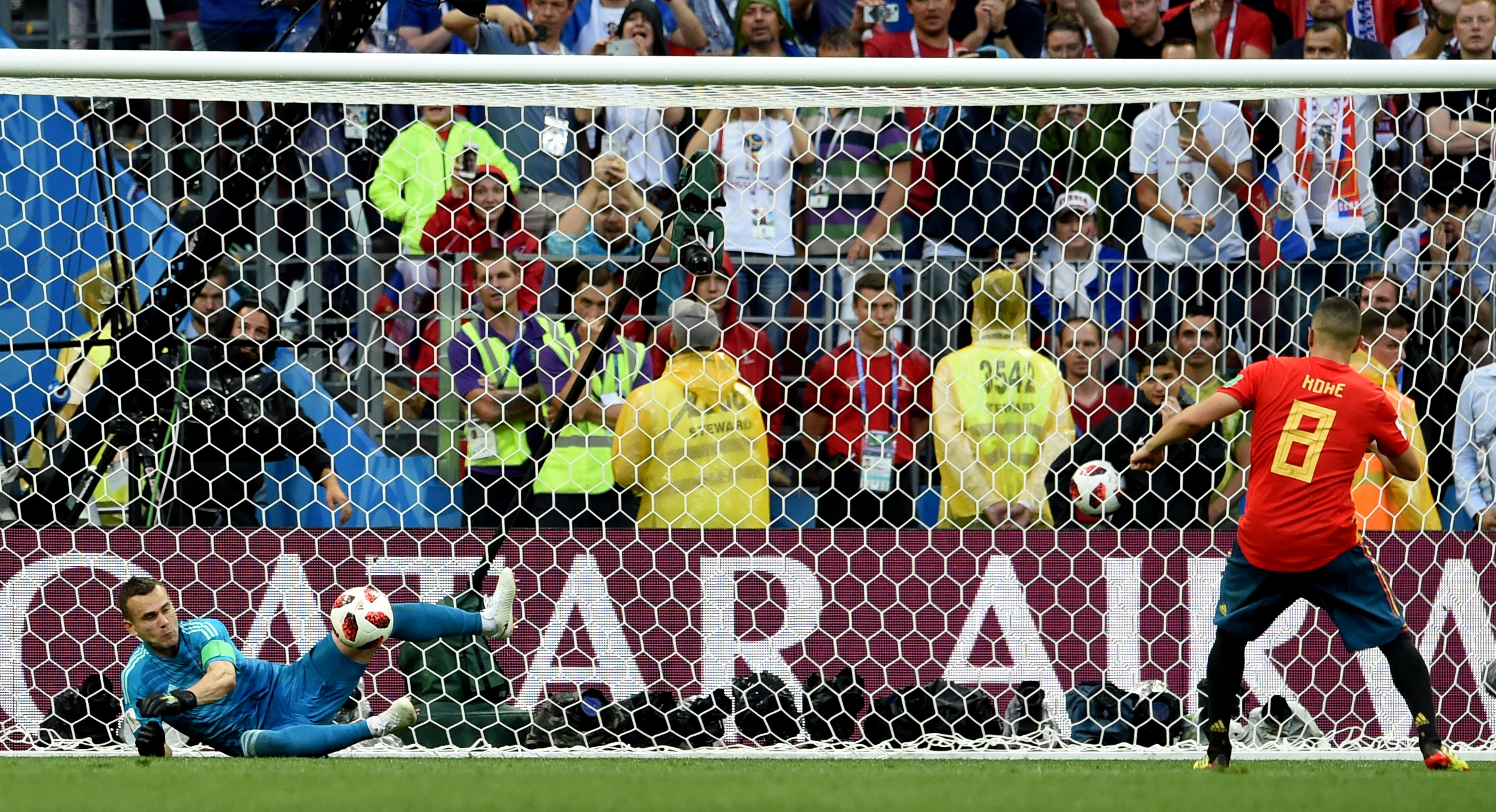 Russia's Igor Akinfeev saves Koke's penalty