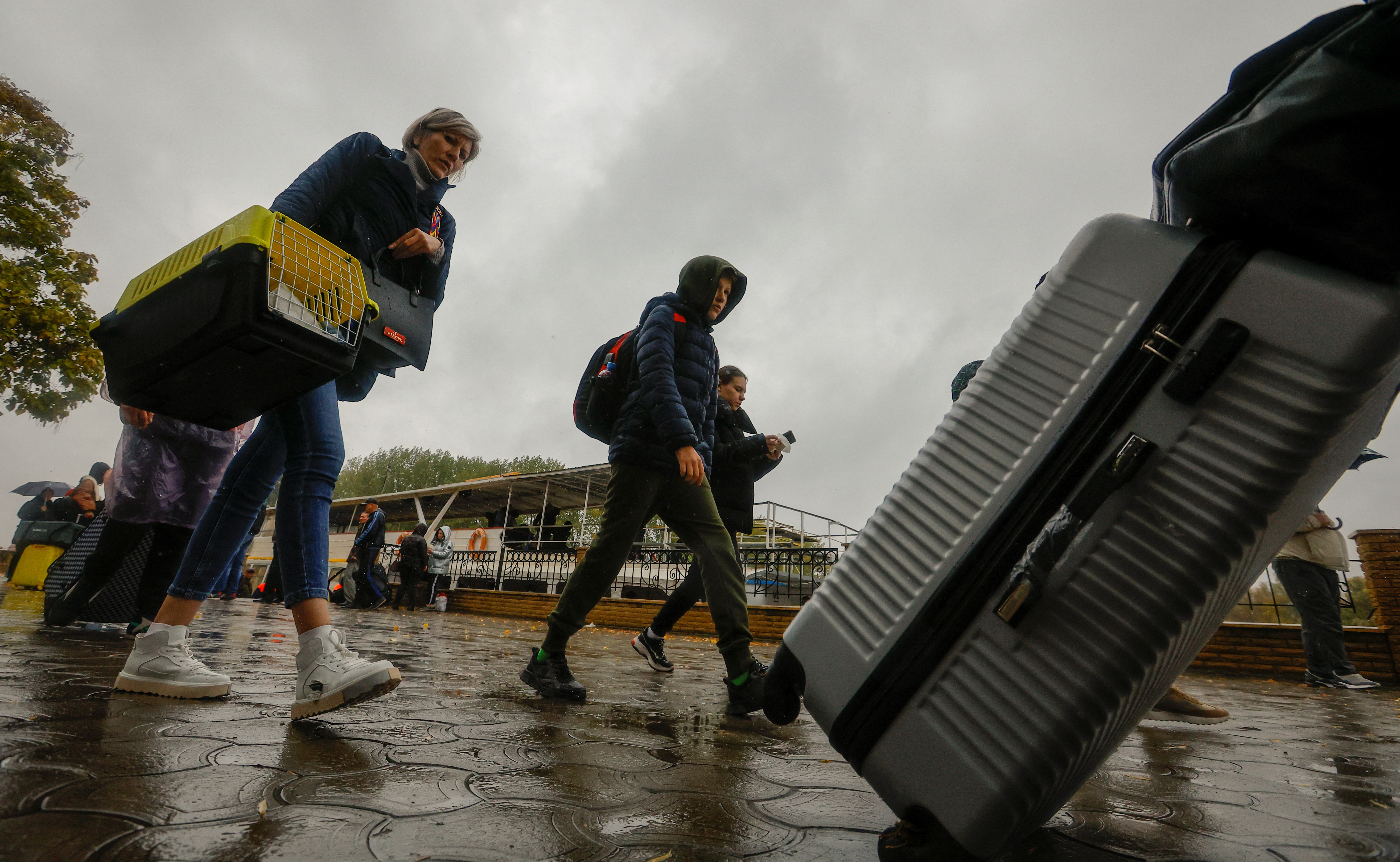 Civilians evacuated from the Russian-controlled city of Kherson