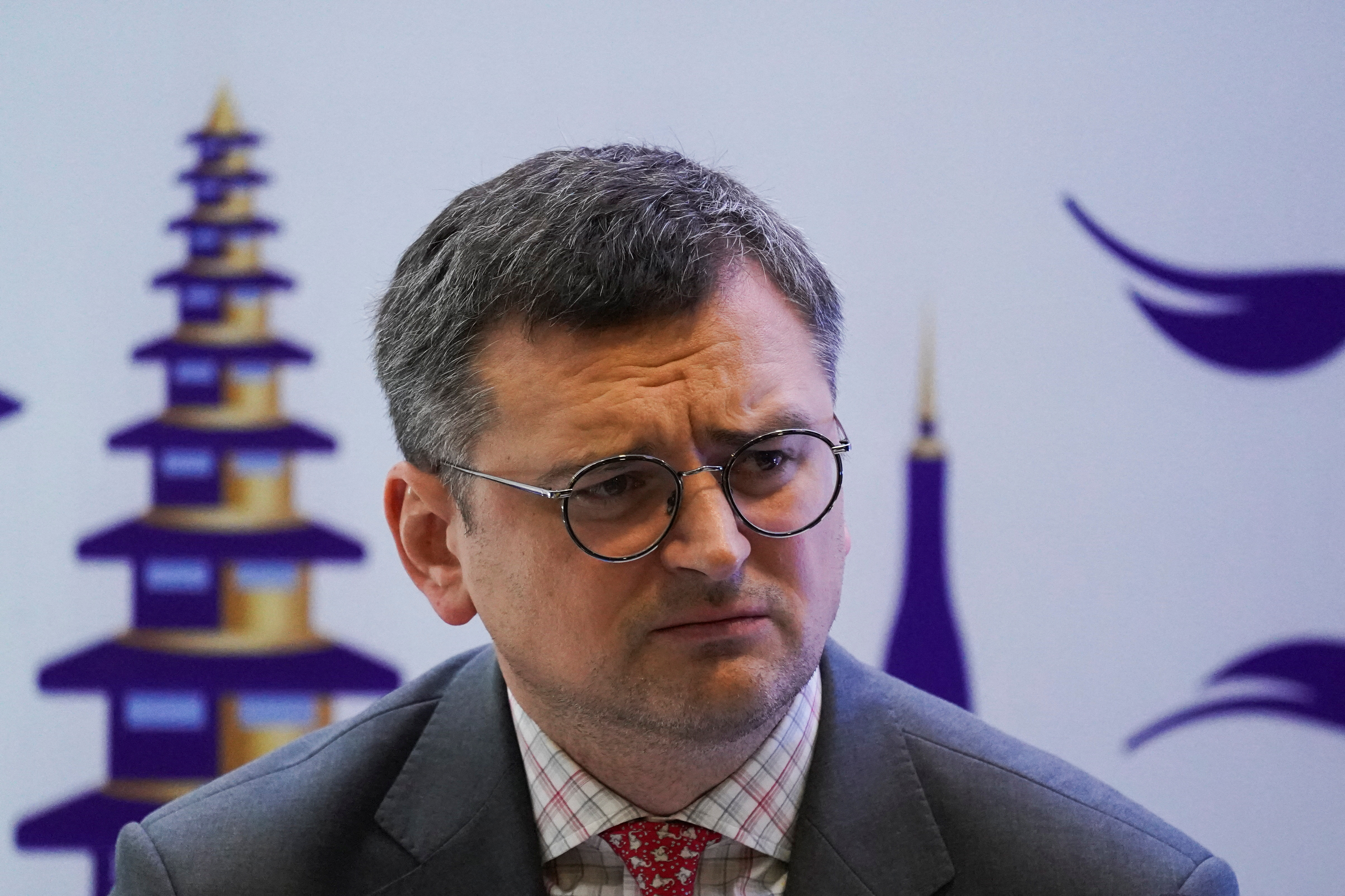 Ukraine Foreign Minister Dmytro Kuleba reacts as he attends a media briefing on the outcomes of his visit to Cambodia and ASEAN summit during the ASEAN summit held in Phnom Penh, Cambodia November 12, 2022. REUTERS/Cindy Liu