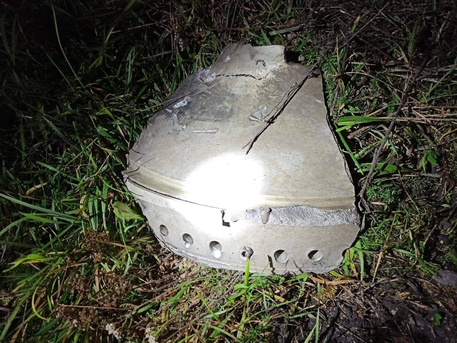 locals claime to be that of a missile, is pictured at the site of an explosion in Przewodow, a village in eastern Poland