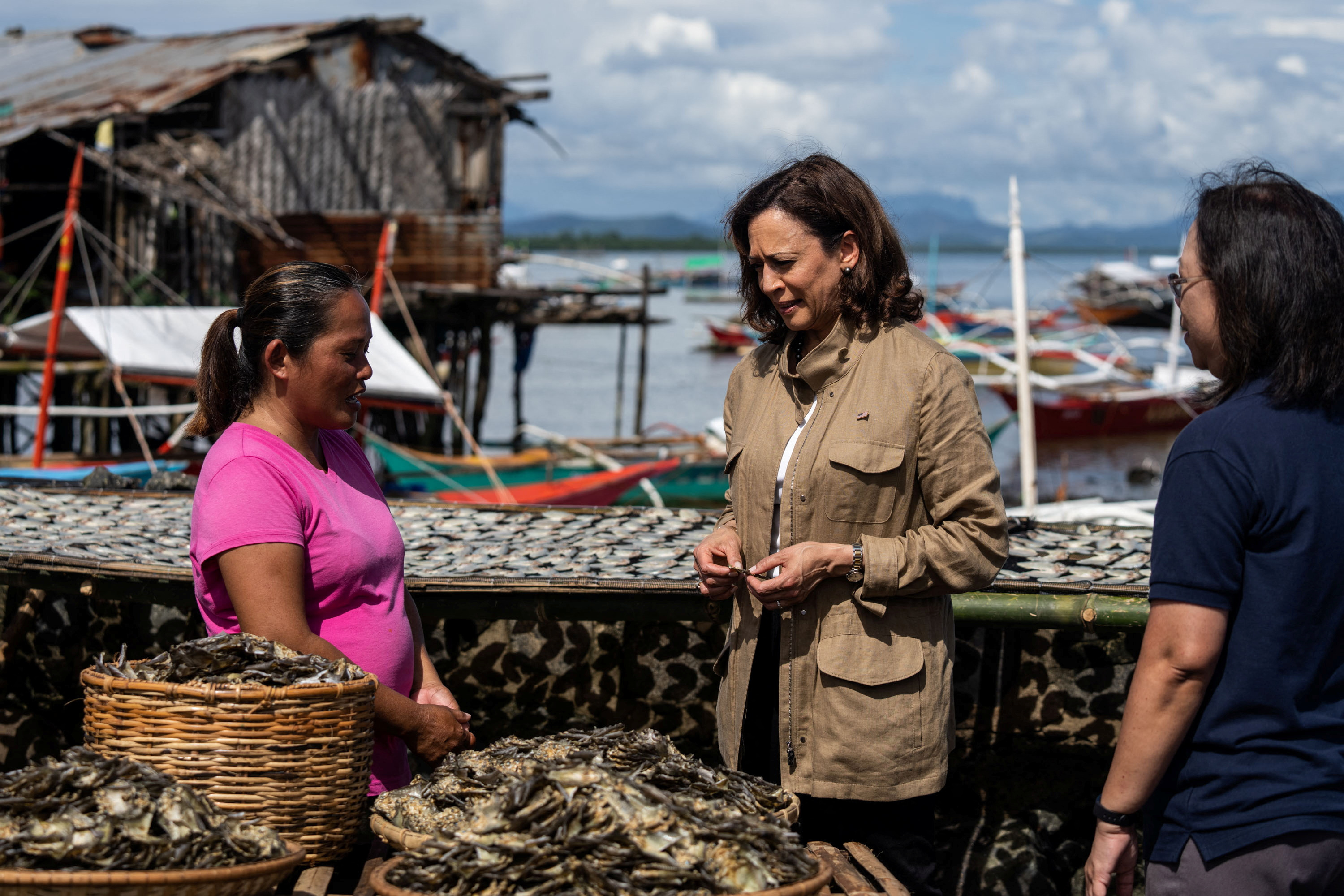 US Vice President Kamala Harris tours the local village Tagburos in Palawan, Philippines, on unsustainable fishing and chats with locals who prepare the fish on Tuesday, November 22, 2022