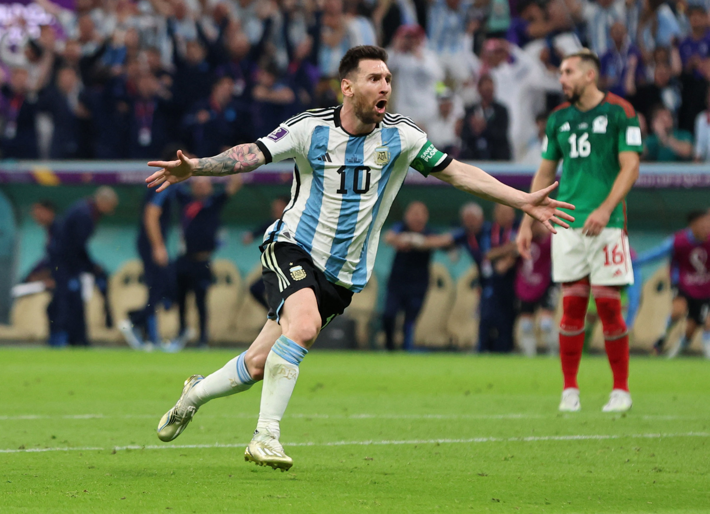 Lionel Messi celebrates scoring a goal.