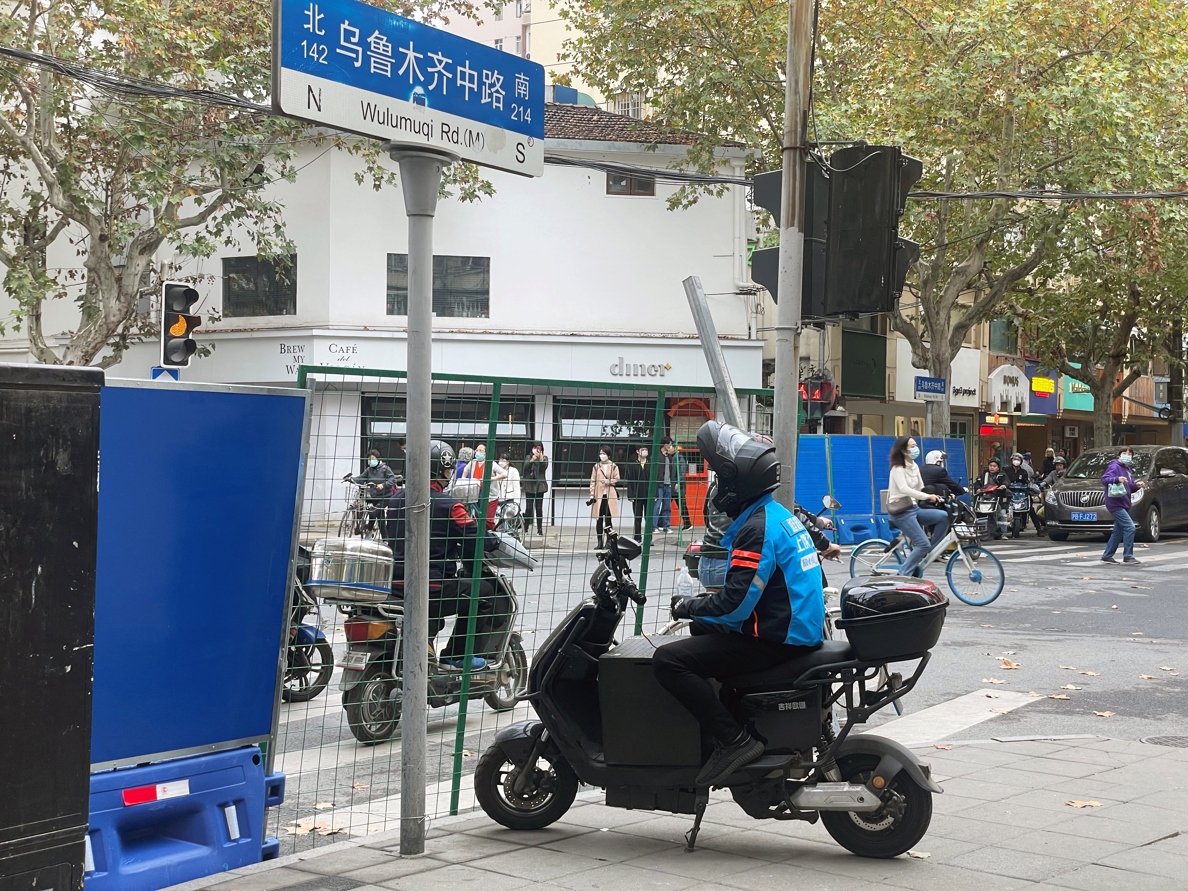 Barriers were set up on Shanghai’s Wulumuqi Road following the angry protests against China’s harsh coronavirus measures