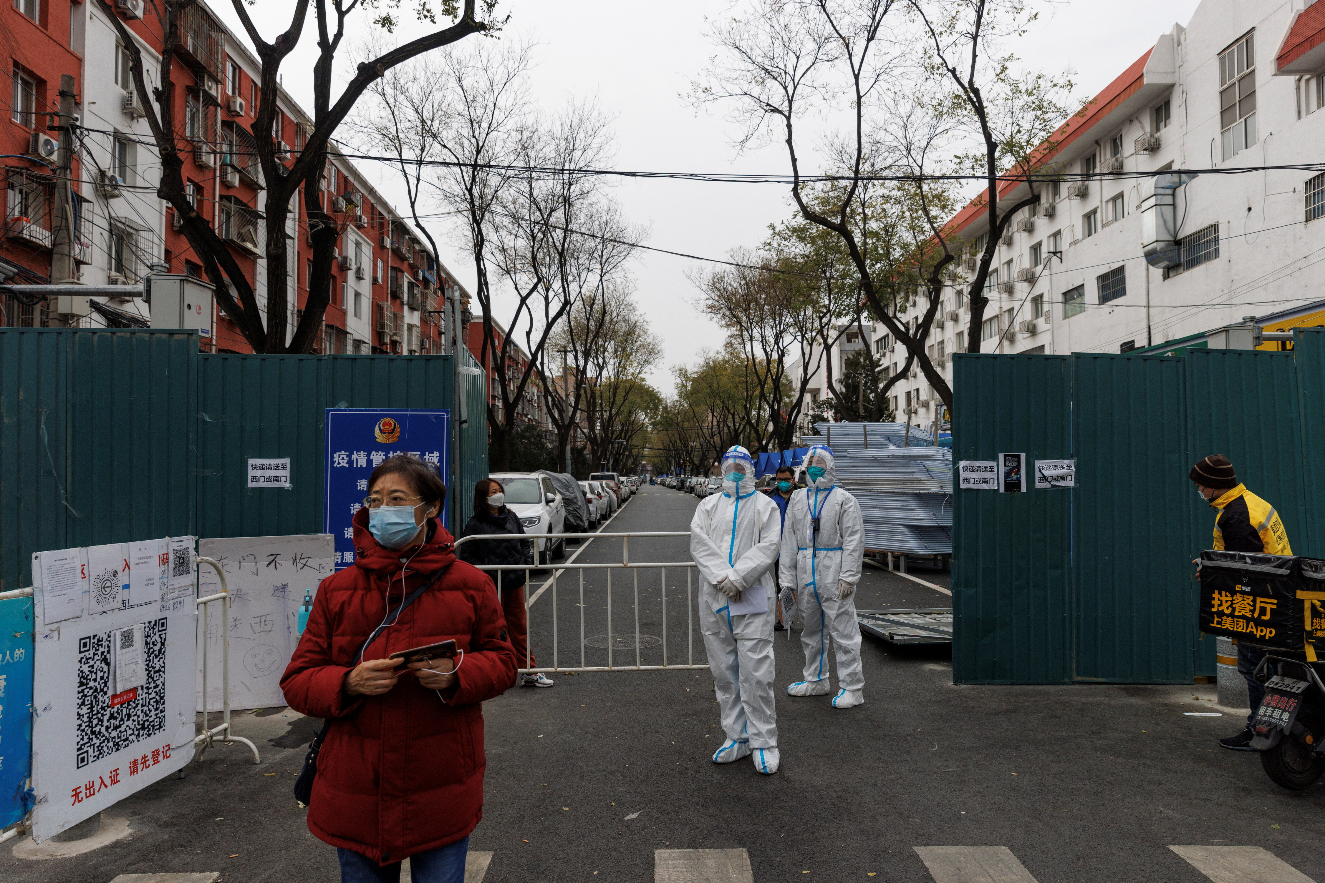 Authorities in Beijing have said community entrances and firefighting access must not be blocked by barriers erected for COVID-19 lockdowns
