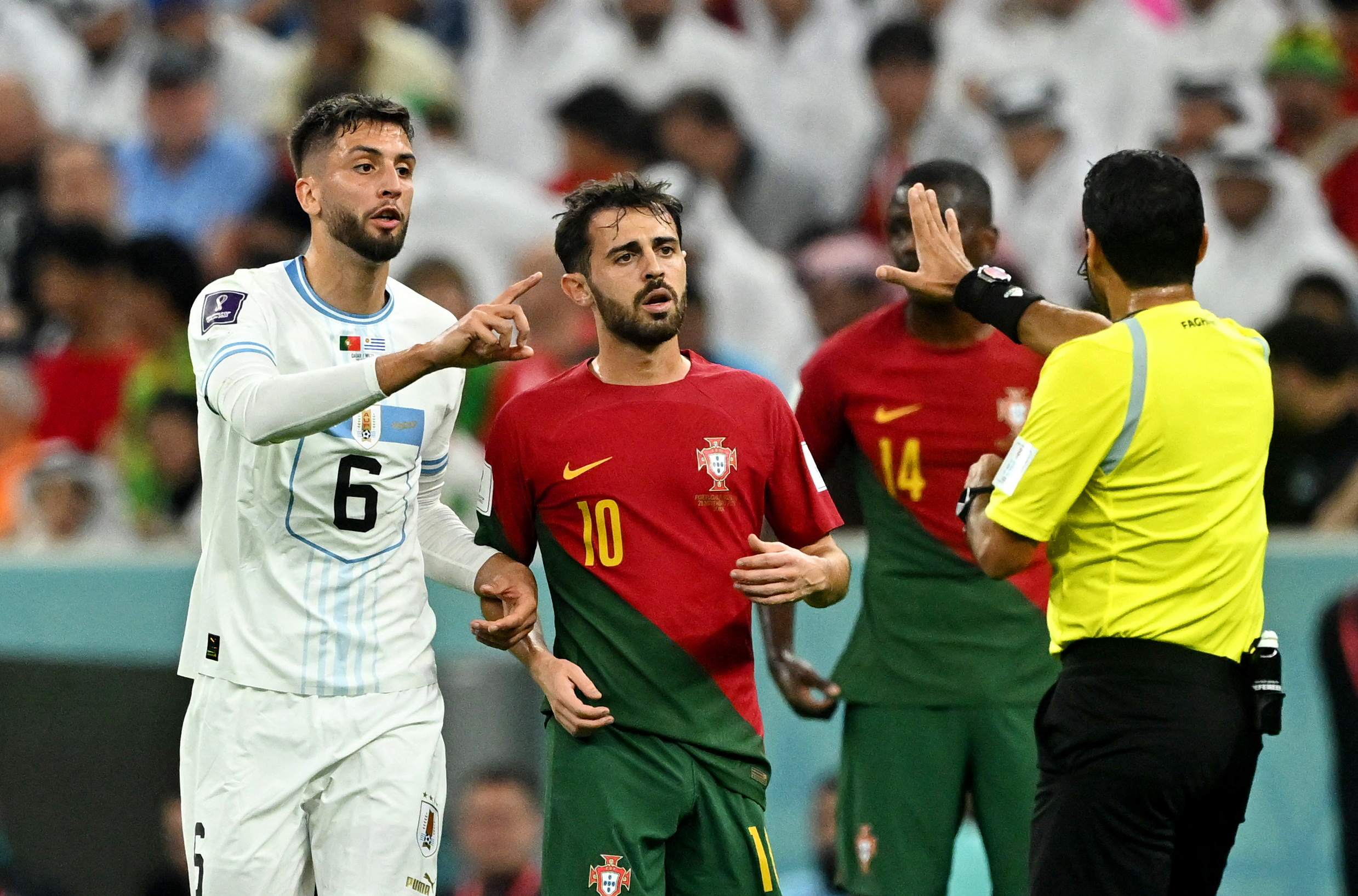 Rodrigo Bentancur remonstrates the referee.