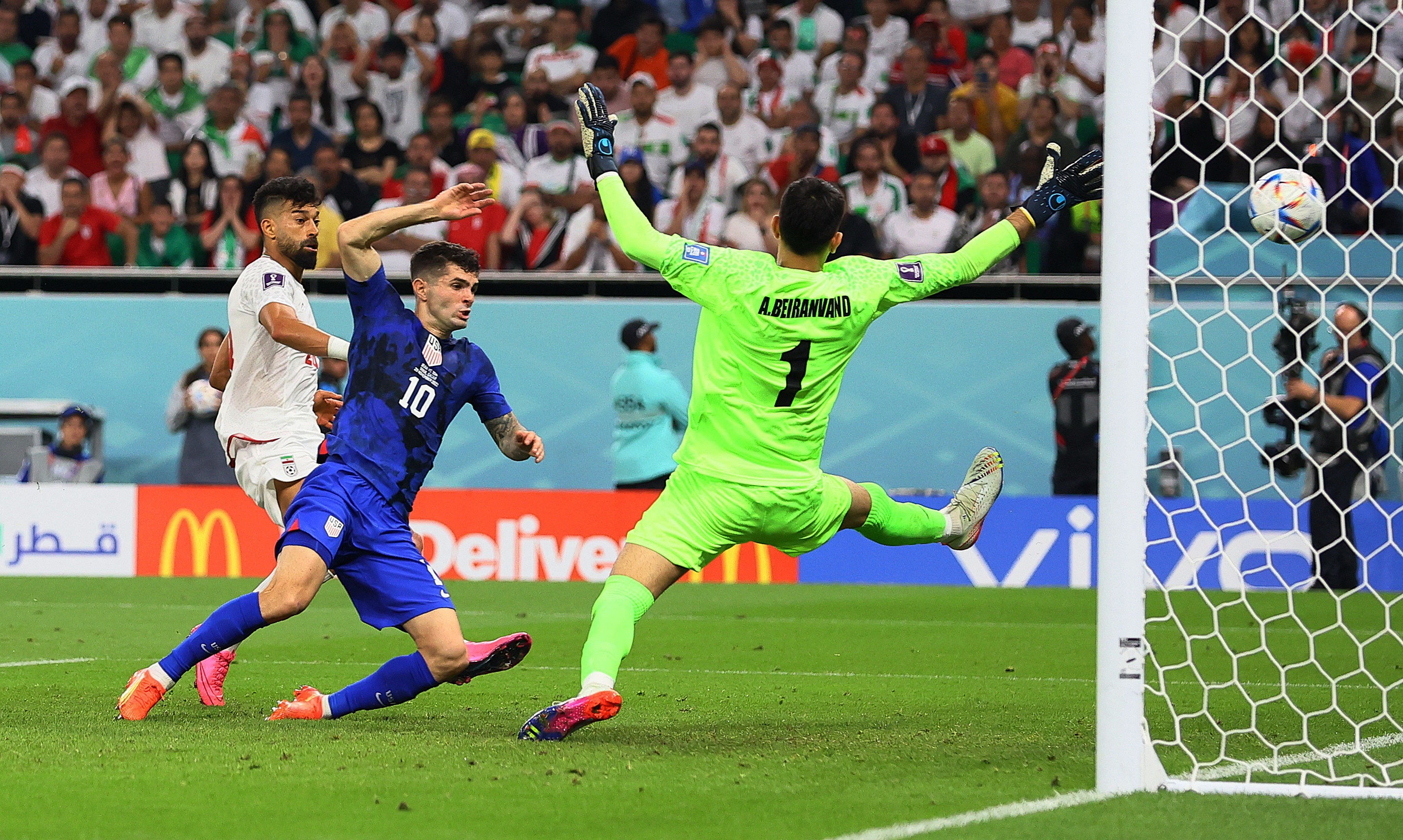 Christian Pulisic of the USA scores their first goal.