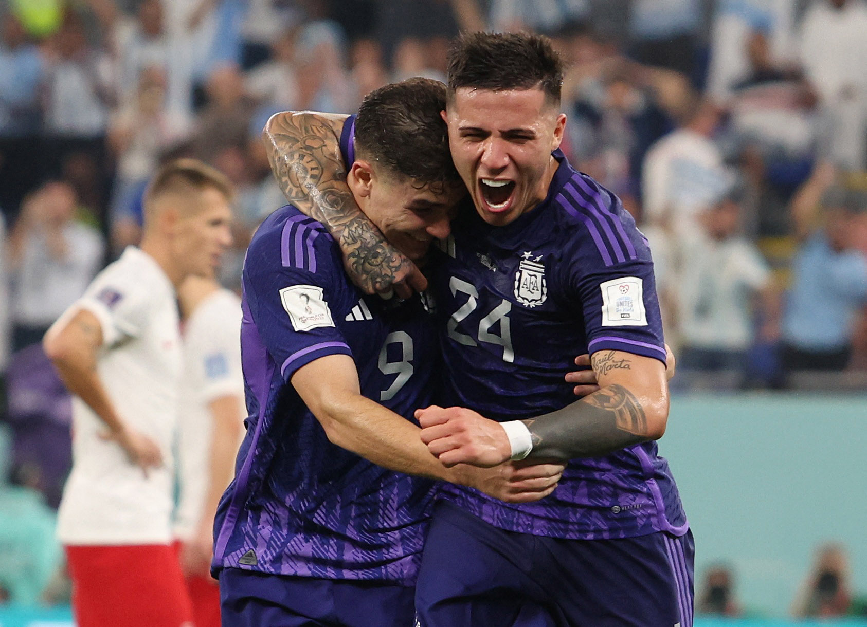Argentina's Julian Alvarez celebrates scoring their second goal with Enzo Fernandez