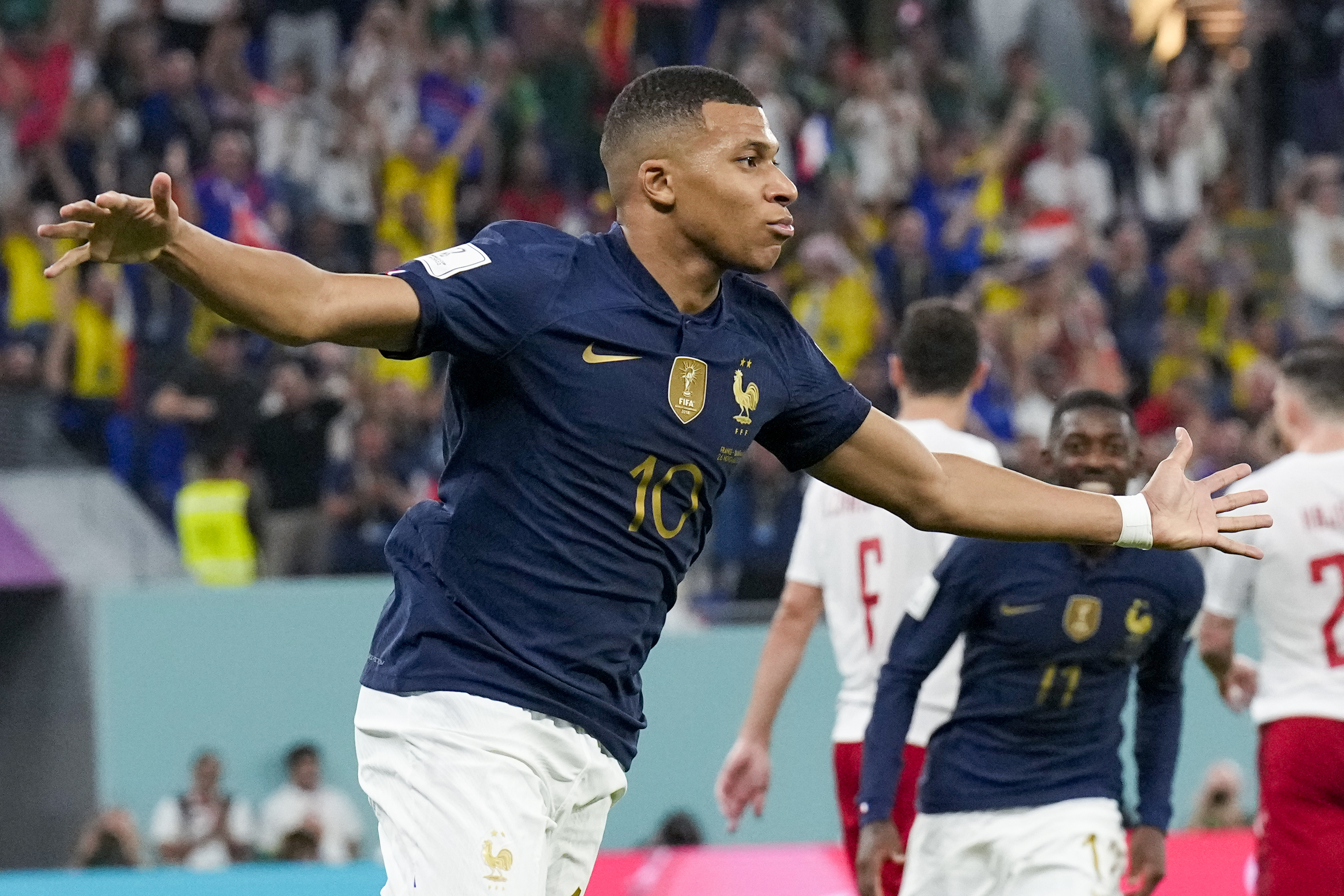 France’s Kylian Mbappe celebrates scoring his side’s opening goal against Denmark during a World Cup group D football match at the Stadium 974 in Doha, Qatar on November 26, 2022