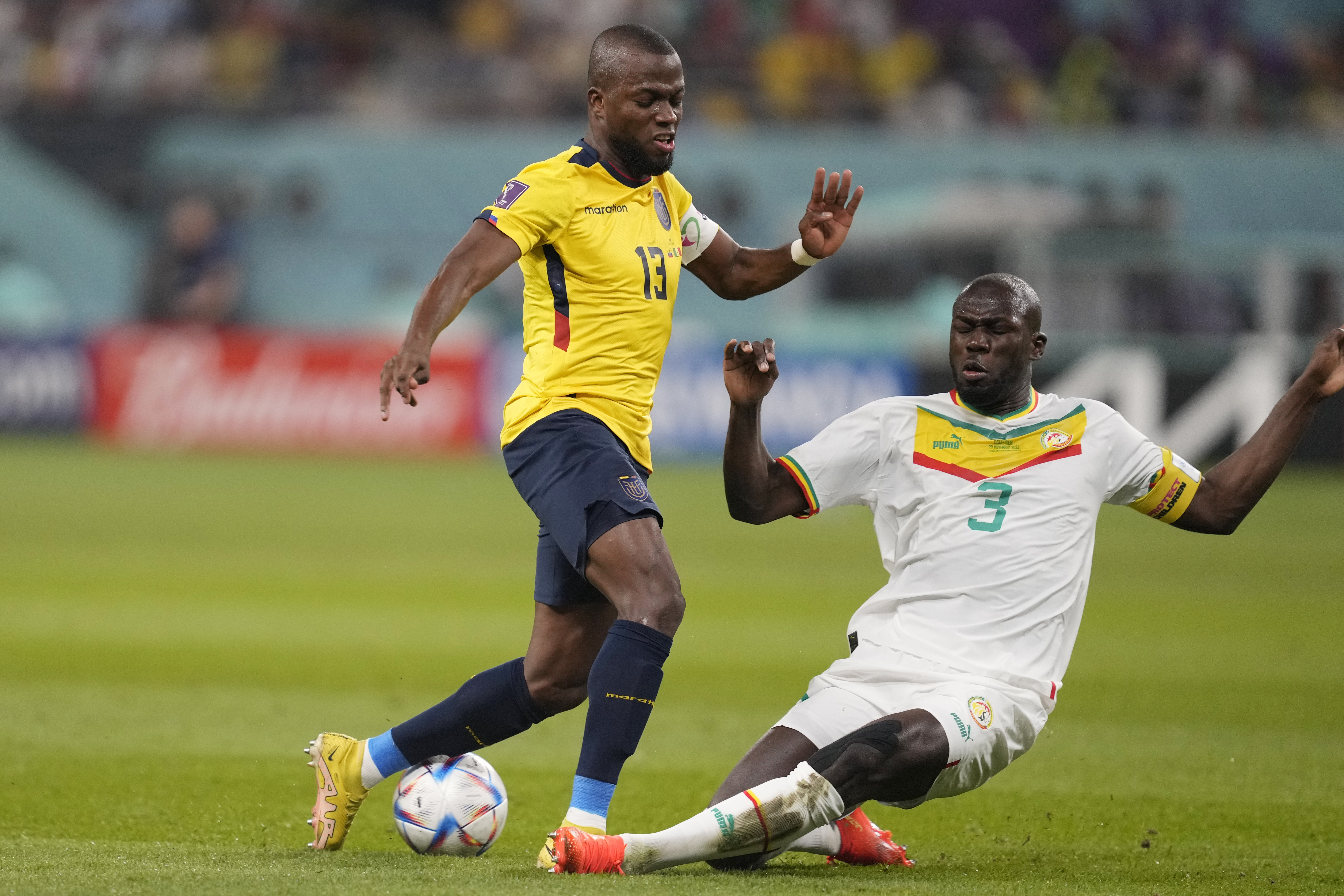 Ecuador’s Enner Valencia (left) and Senegal’s Kalidou Koulibaly challenge for the ball during the Group A match at the Khalifa International Stadium in Doha, Qatar, November 29, 2022