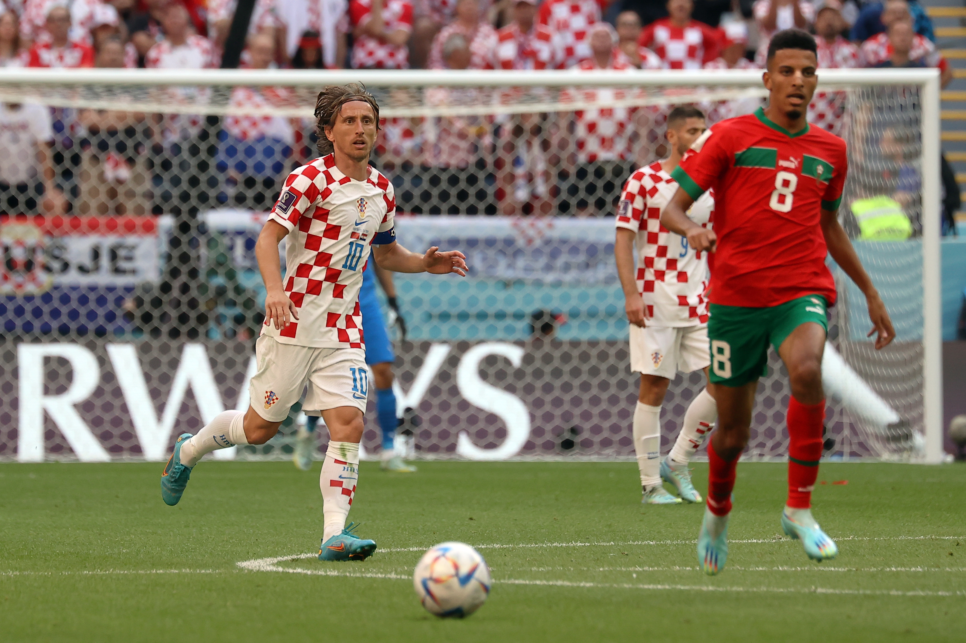 Croatia’s Luka Modric behind Morocco’s Azzedine Ounahi
