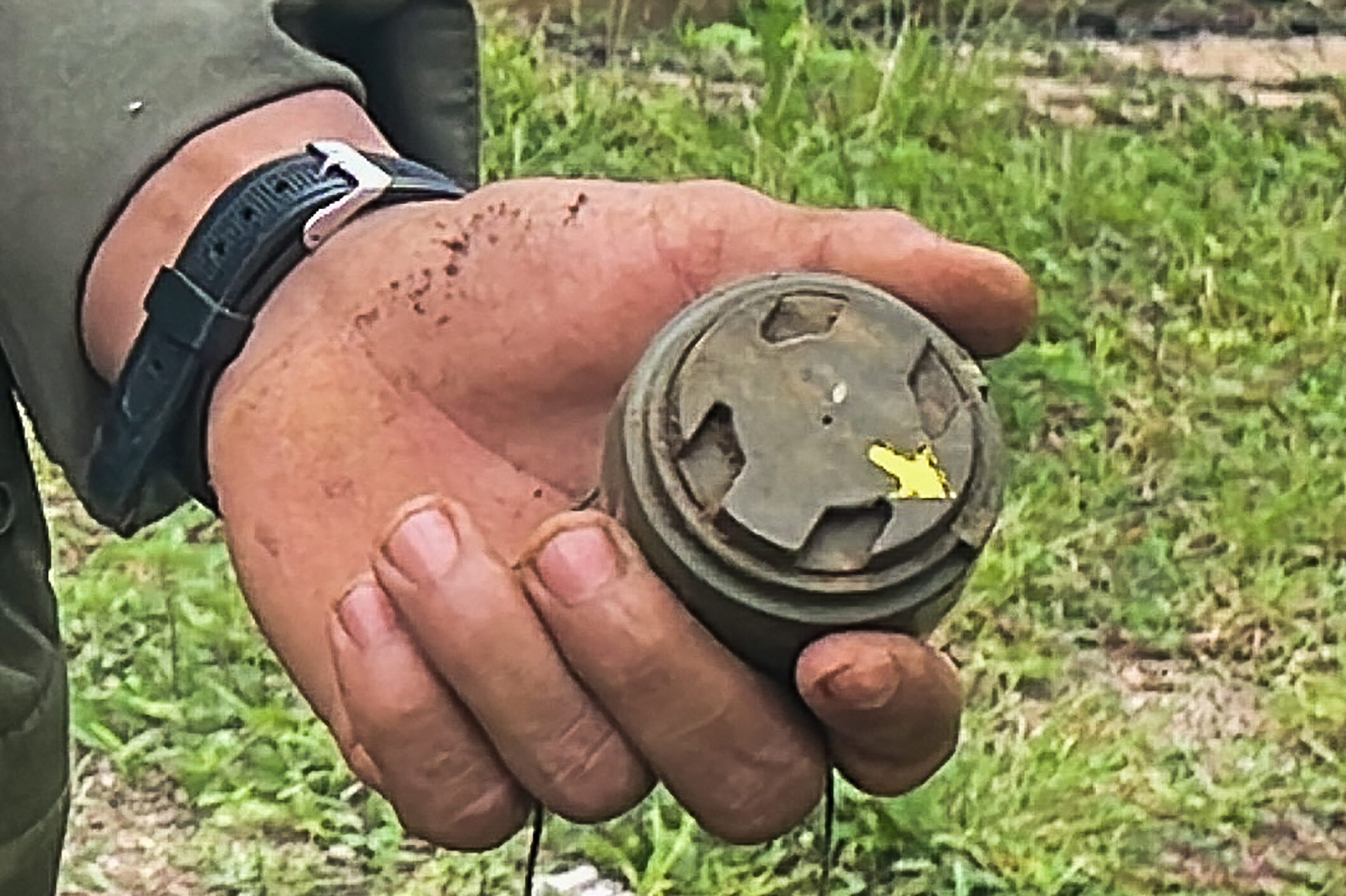 This handout photo from Amnesty International taken between June 27 and July 4, 2022 and released on July 20 shows an M14 landmine found by deminers in Kayah State in eastern Myanmar. - Myanmar junta troops are committing war crimes by laying landmines on a 