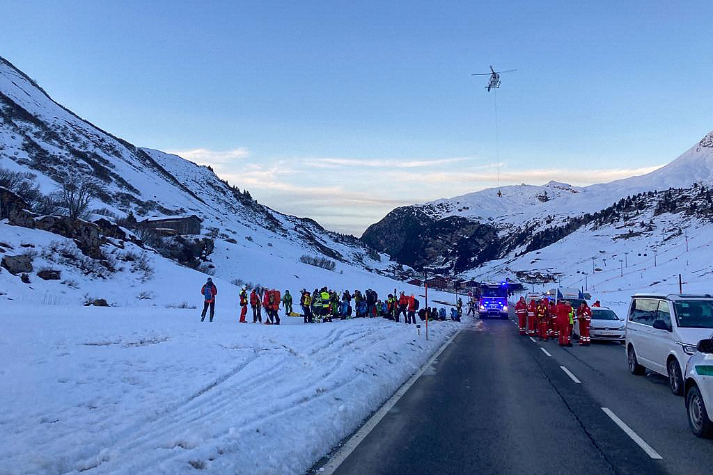 Members of the emergency services working near the scene of the avalanche at Bregenz [Handout via AFP]