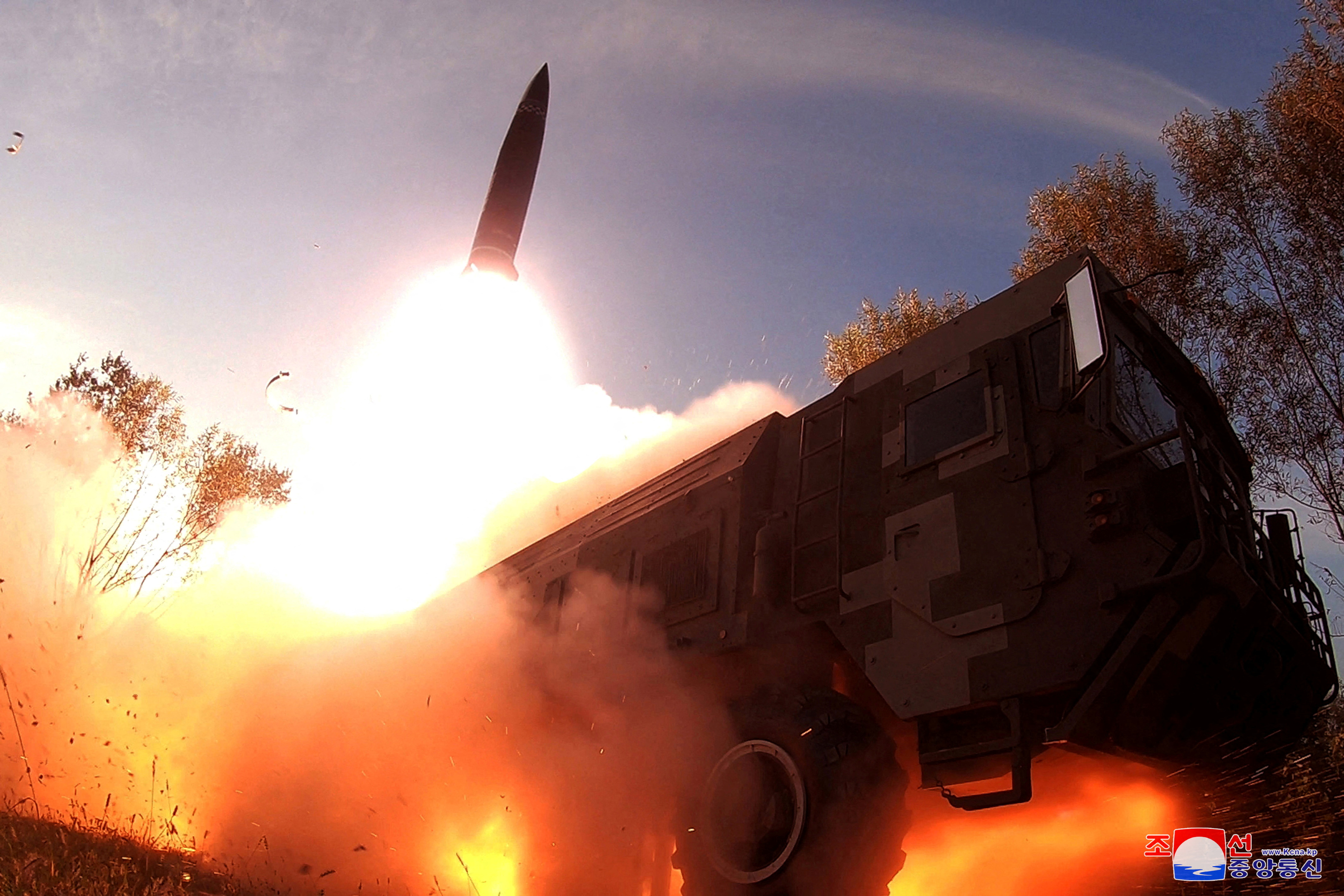 A missile launch is seen at an undisclosed location in North Korea.