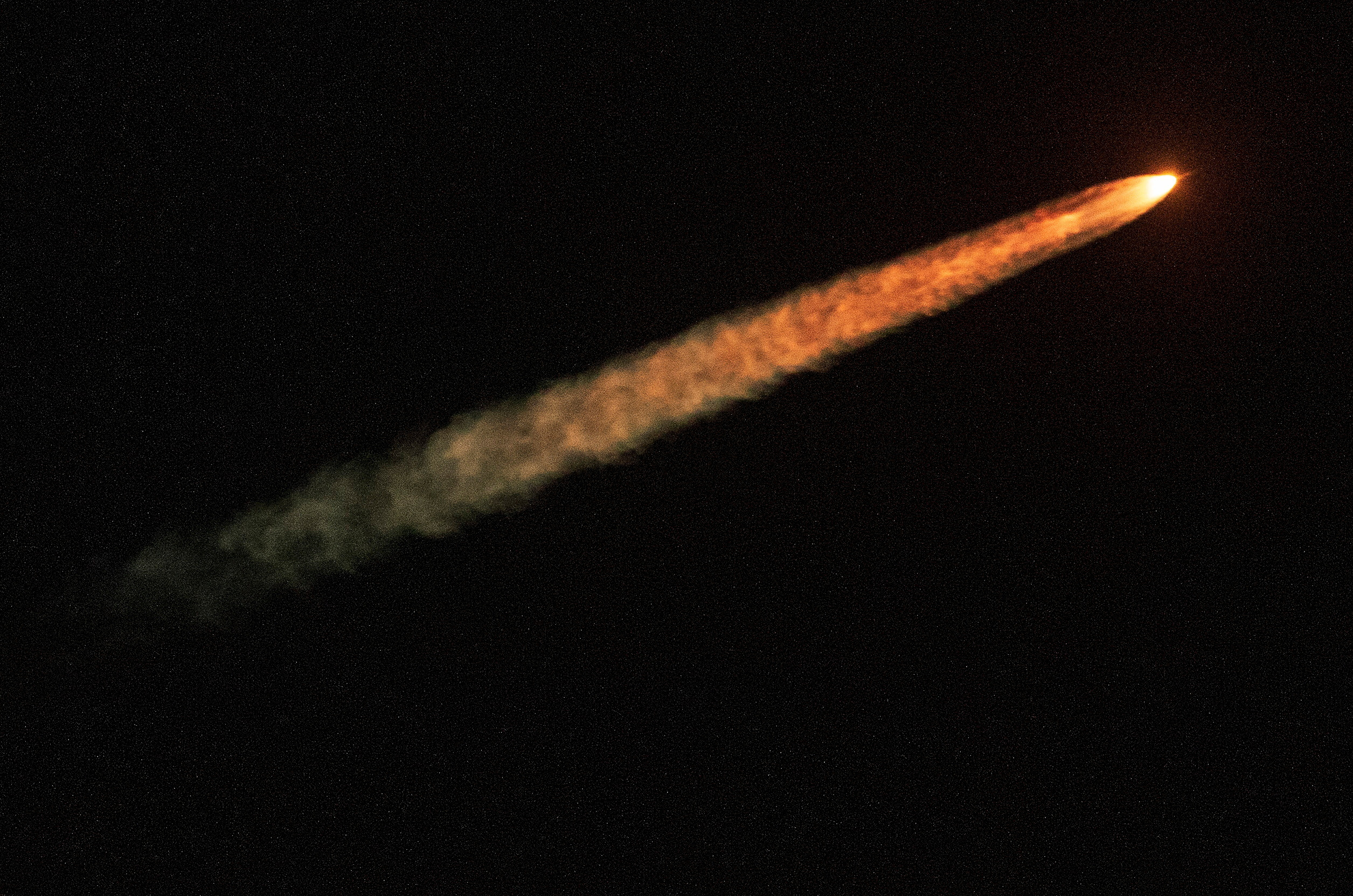 NASA's Space Launch System rocket with the Orion crew capsule lifts off on the unmanned Artemis 1 mission to the moon.