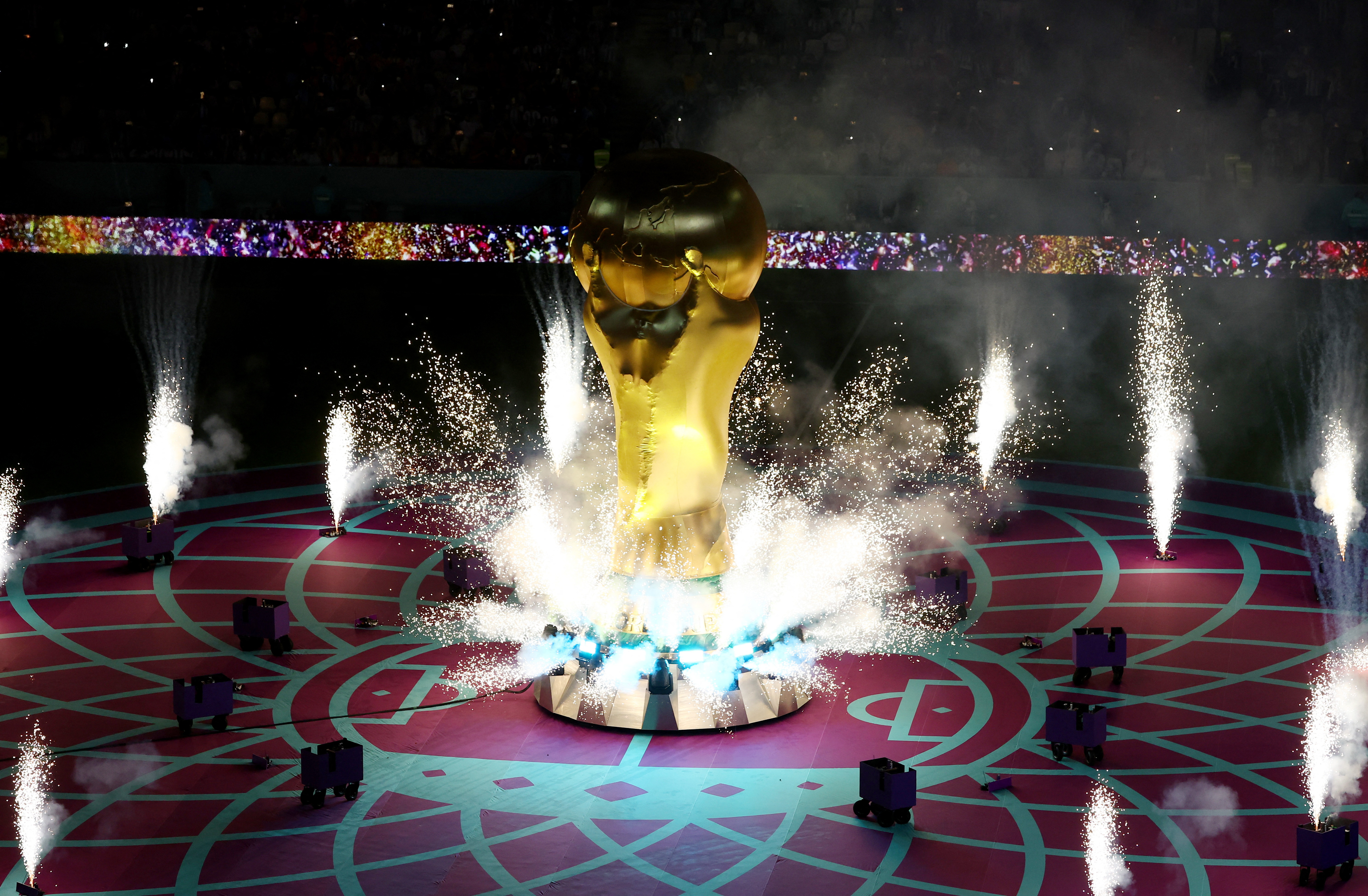 General view of a giant replica trophy on the pitch at Lusail Stadium on December 9 before a Netherlands-Argentina game