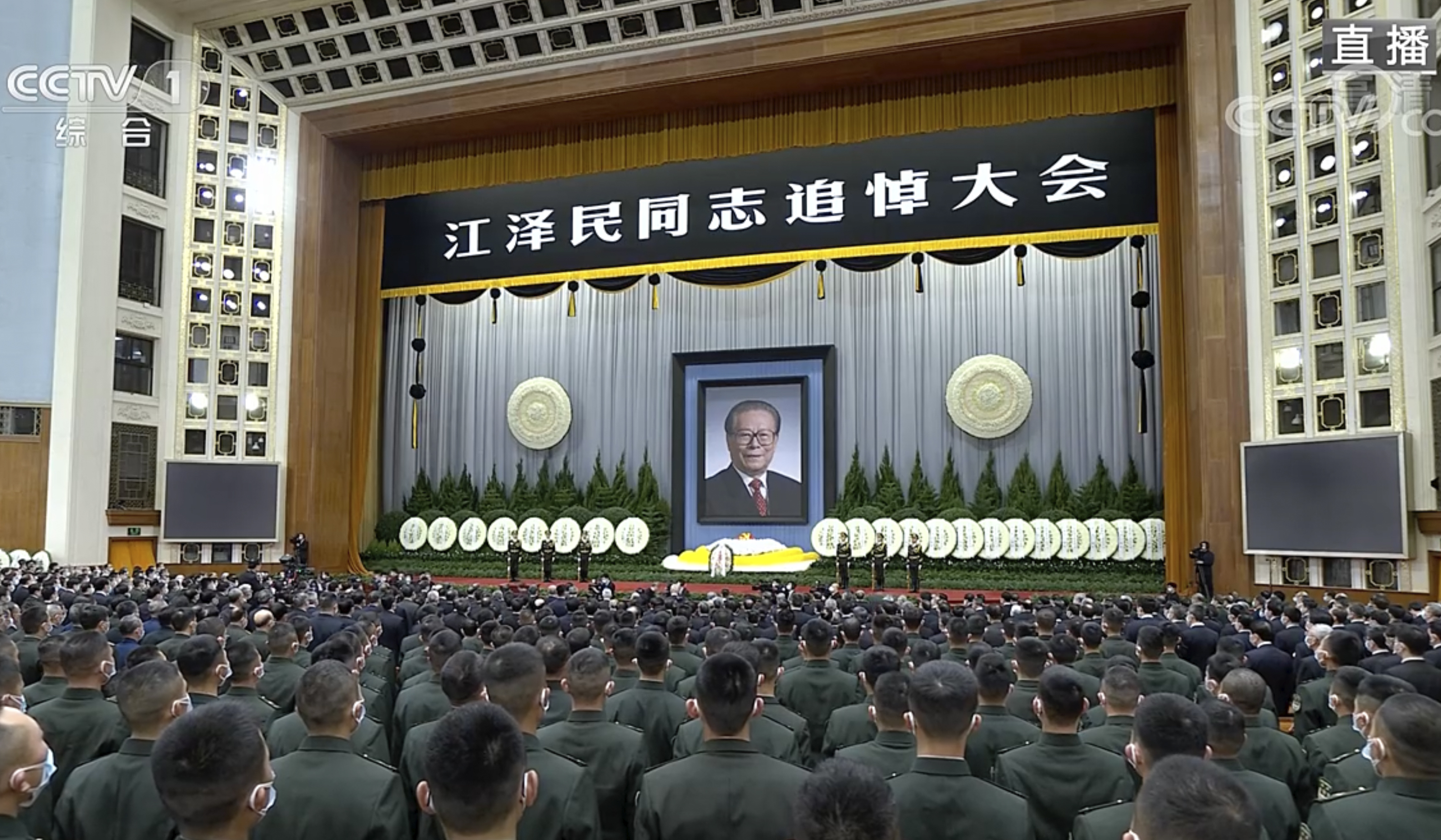 A memorial for Jiang at the Great Hall of the People in Beijing was broadcast live on television. The characters at the top of the stage read Comrade Jiang Zemin Memorial Service [CCTV via AP]