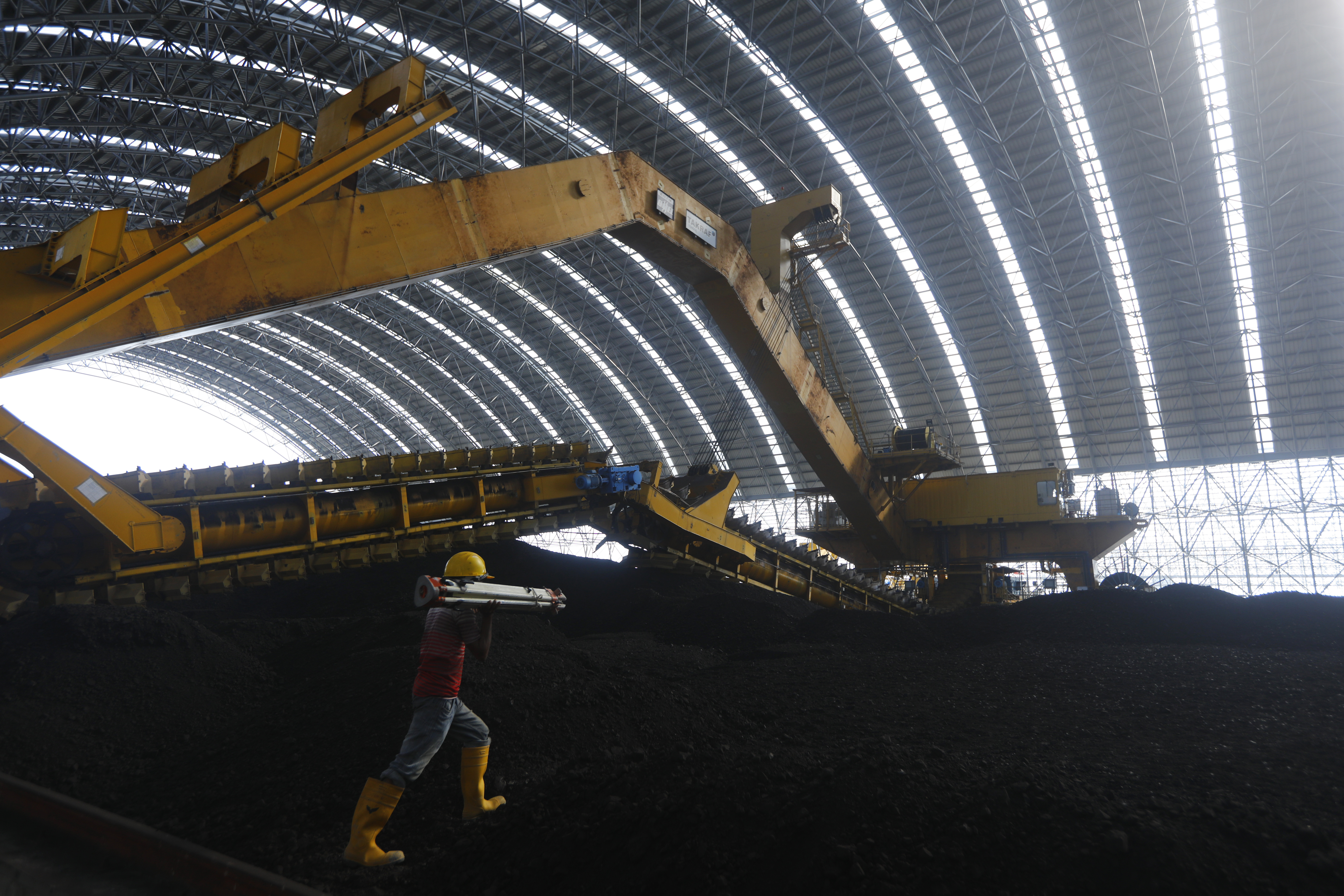 Coal is being stored for the Maitree Super Thermal Power Project