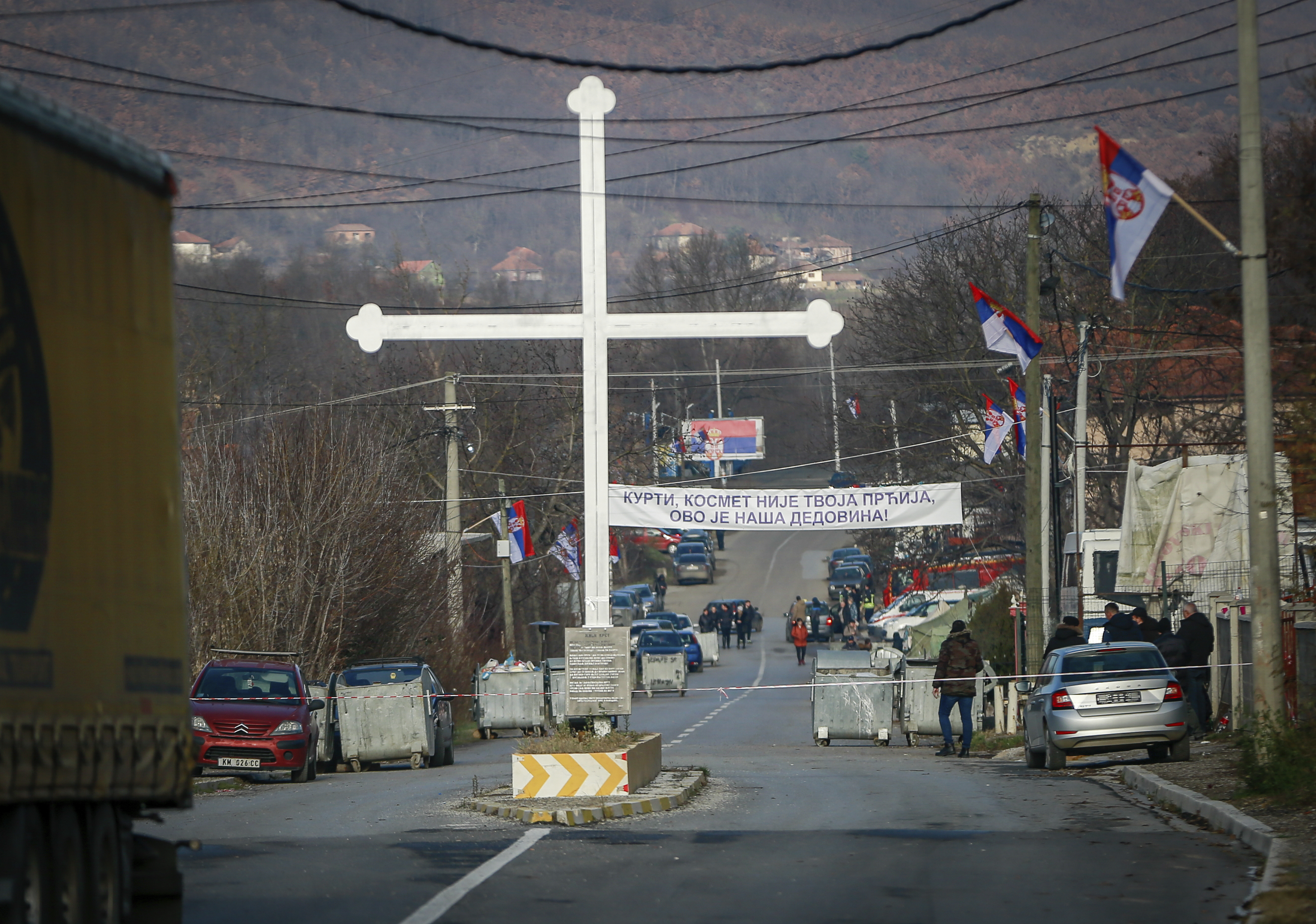 Serb protesters stand at the barricade near the village of Rudare, close to Zvecan, near the northern, Serb-dominated part of ethnically divided town of Mitrovica, Kosovo,