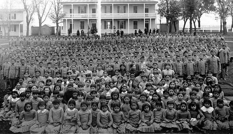 For roughly a century, the US government forced Indigenous children to attend boarding schools far from their families and communities [Courtesy of Wikimedia Commons]