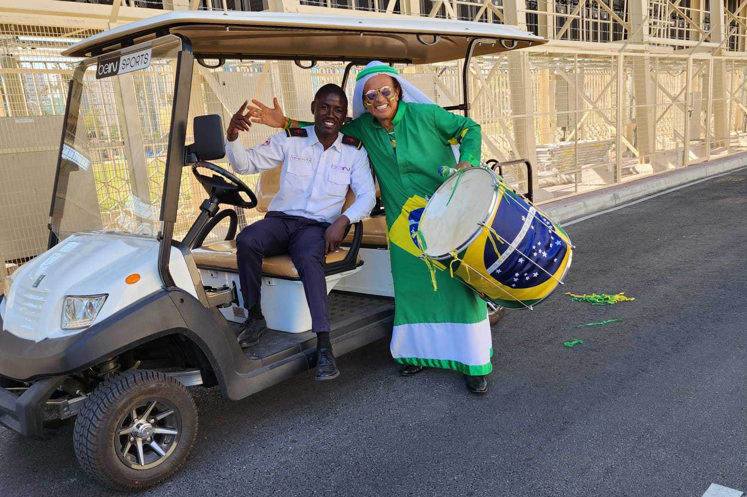 Leite (right) in Doha, Qatar with his Surdao, an instrument he has used at every World Cup game since the 1990 tournament in Italy [Courtesy of Wallace Leite]