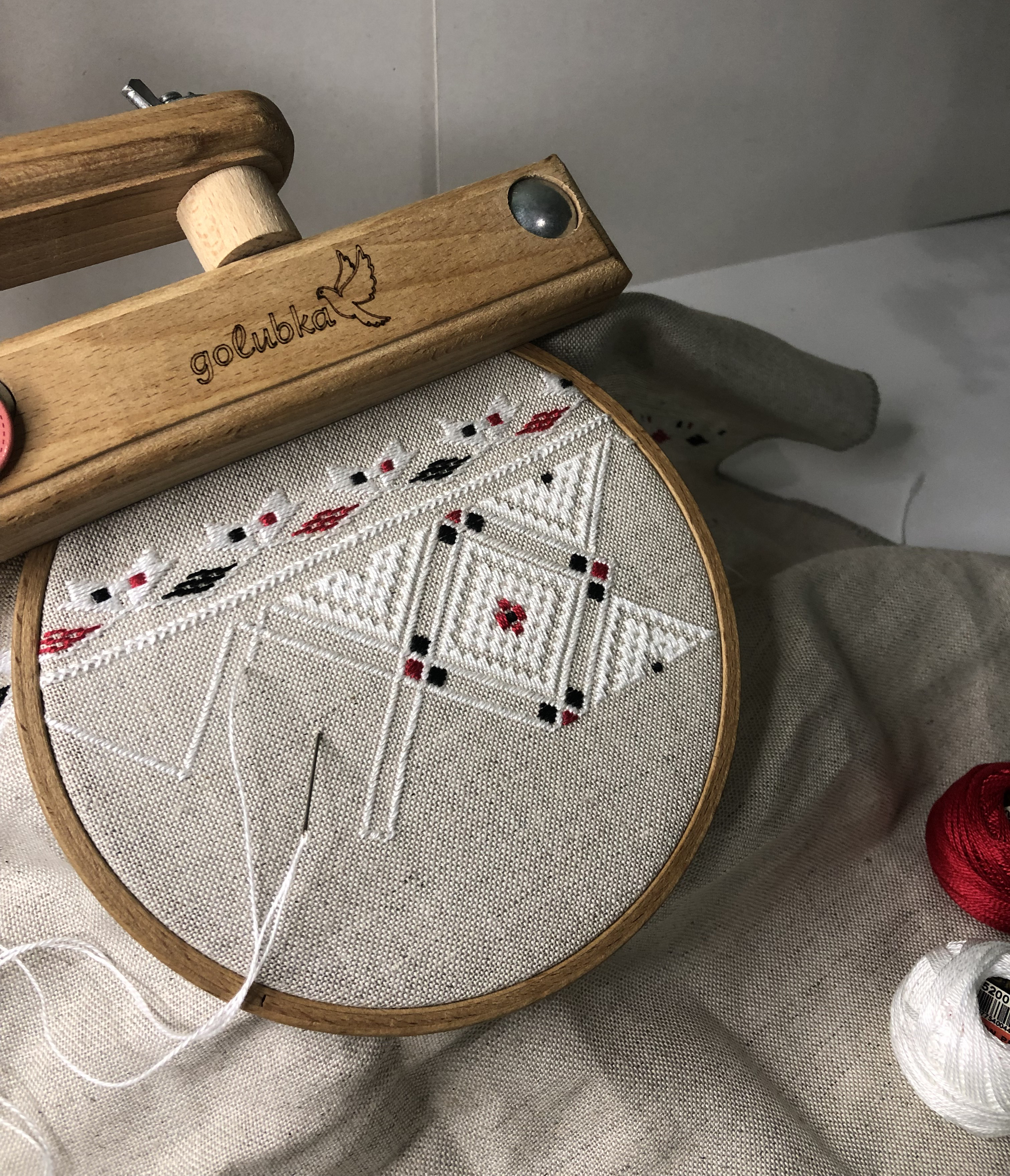 Details of a century-old pattern from the region of Chernihiv on natural hemp cloth that 24-year-old Maryana Lyba is currently working on for a US-based client [Courtesy Maryana Lyba]