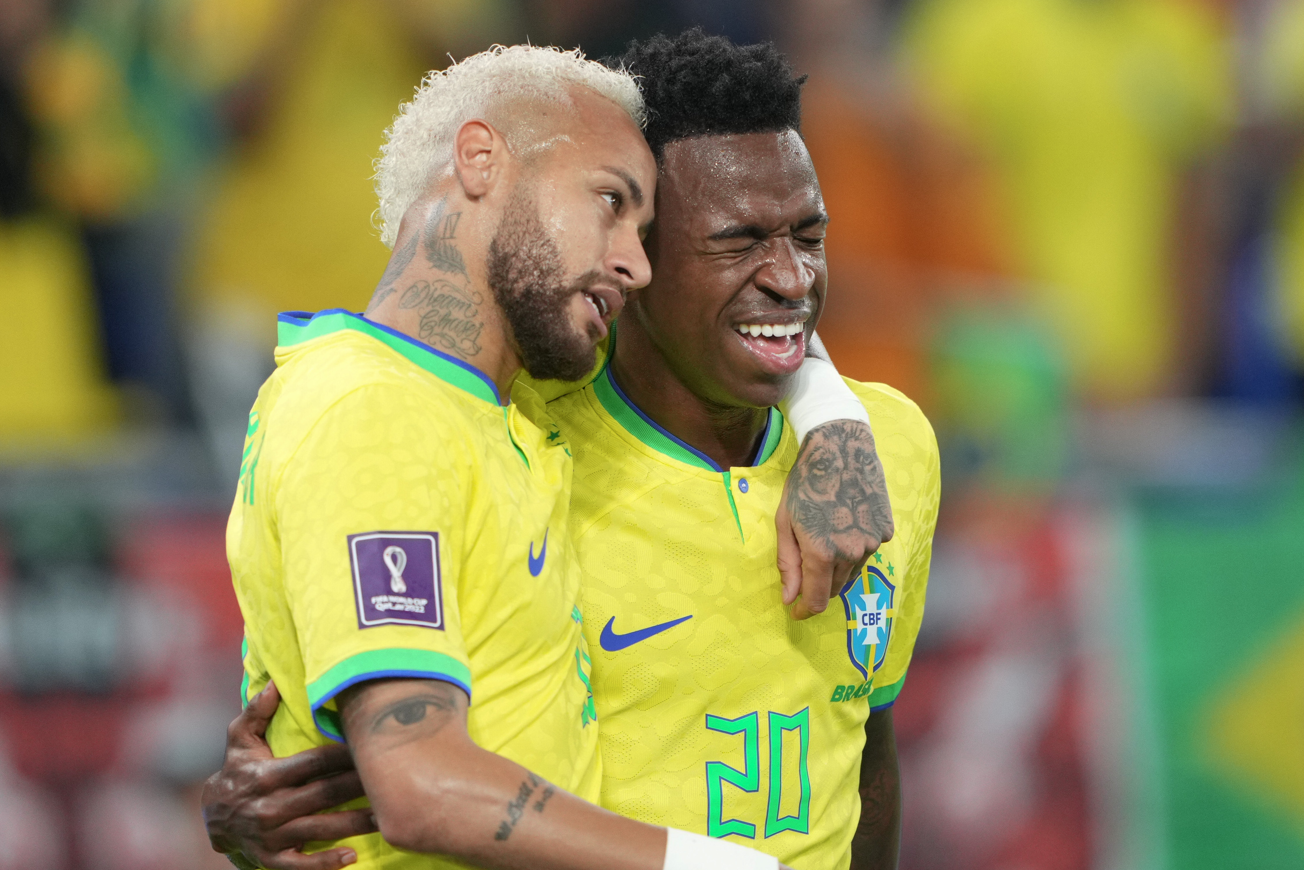Vinicius Jr, right, congratulated by Neymar Jr at Stadium 974
