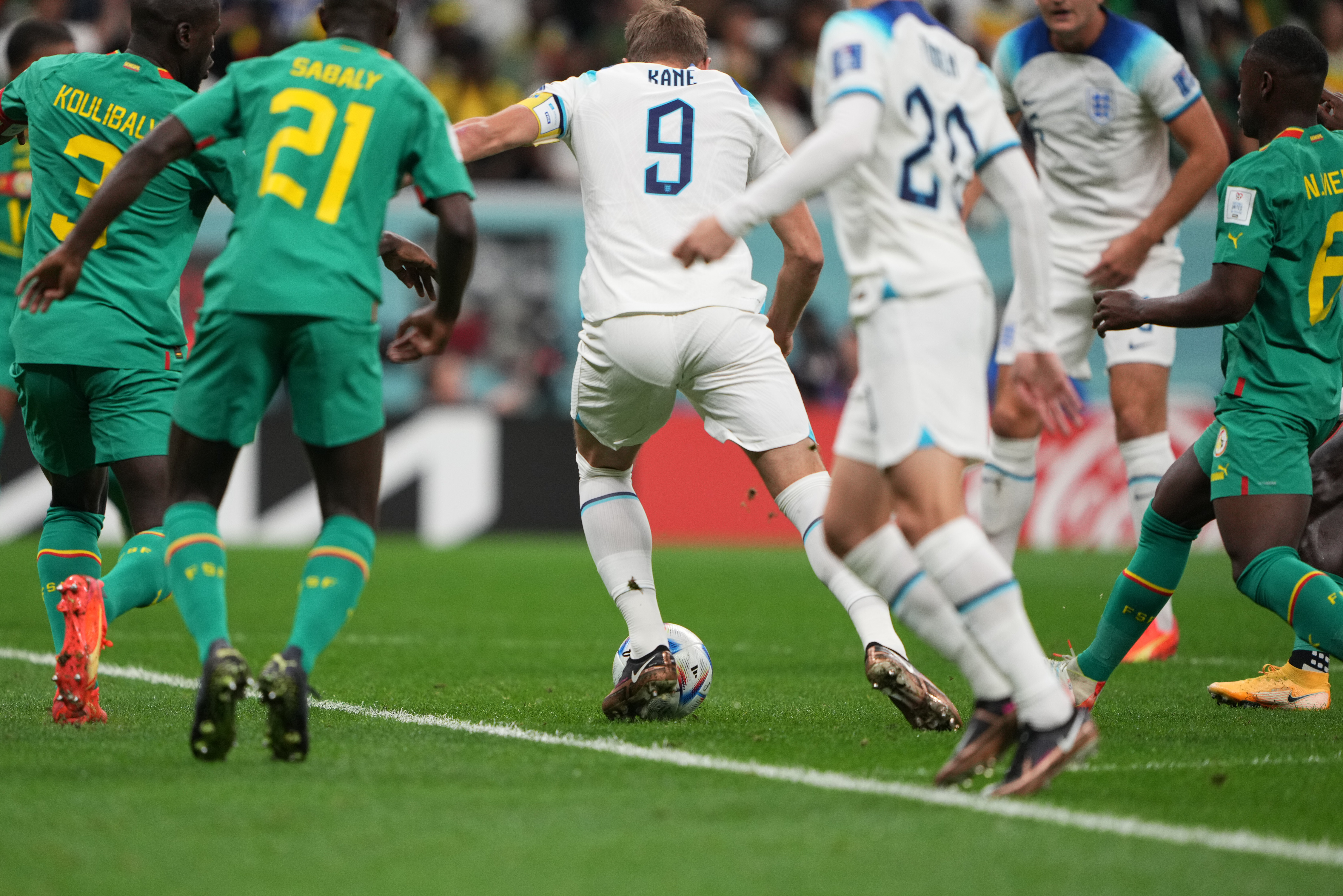 Harry Kane among Senegal defenders.