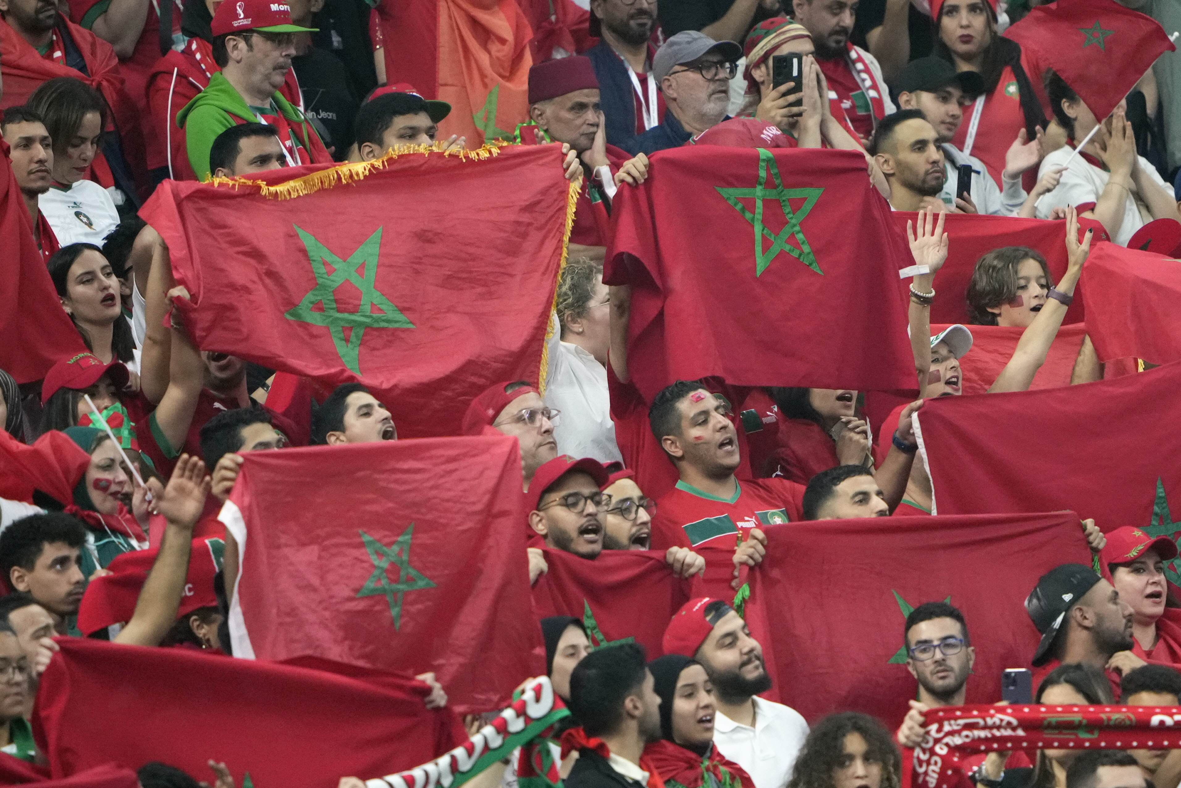 Morocco fans honour their team’s performance after the match